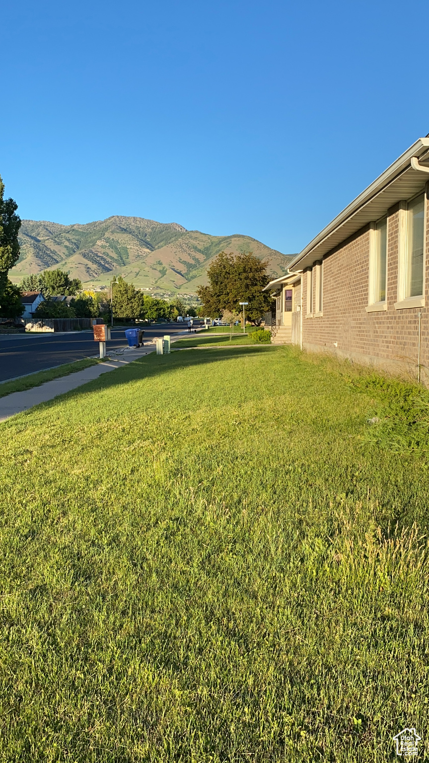 View of yard with a mountain view