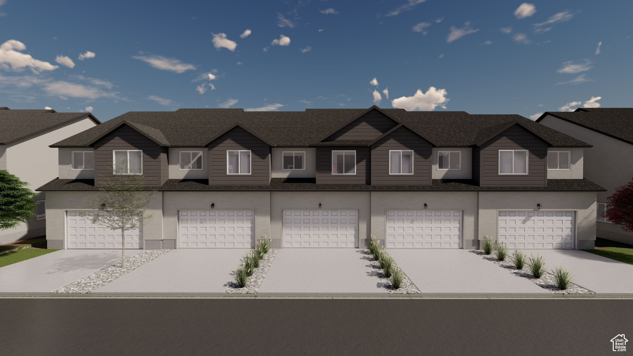 Townhome / multi-family property with a garage