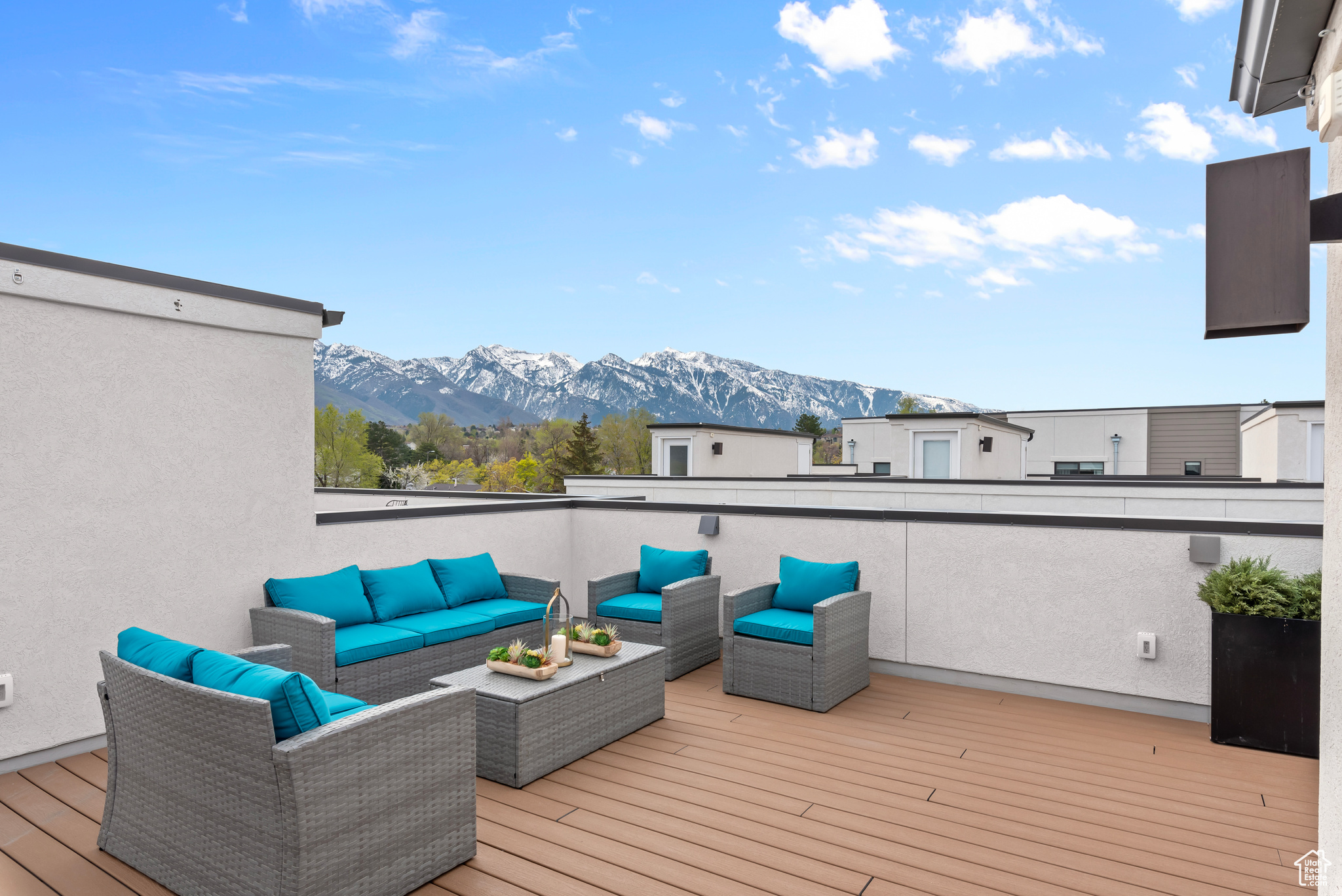 Roof Top Deck with an outdoor living space and a mountain view