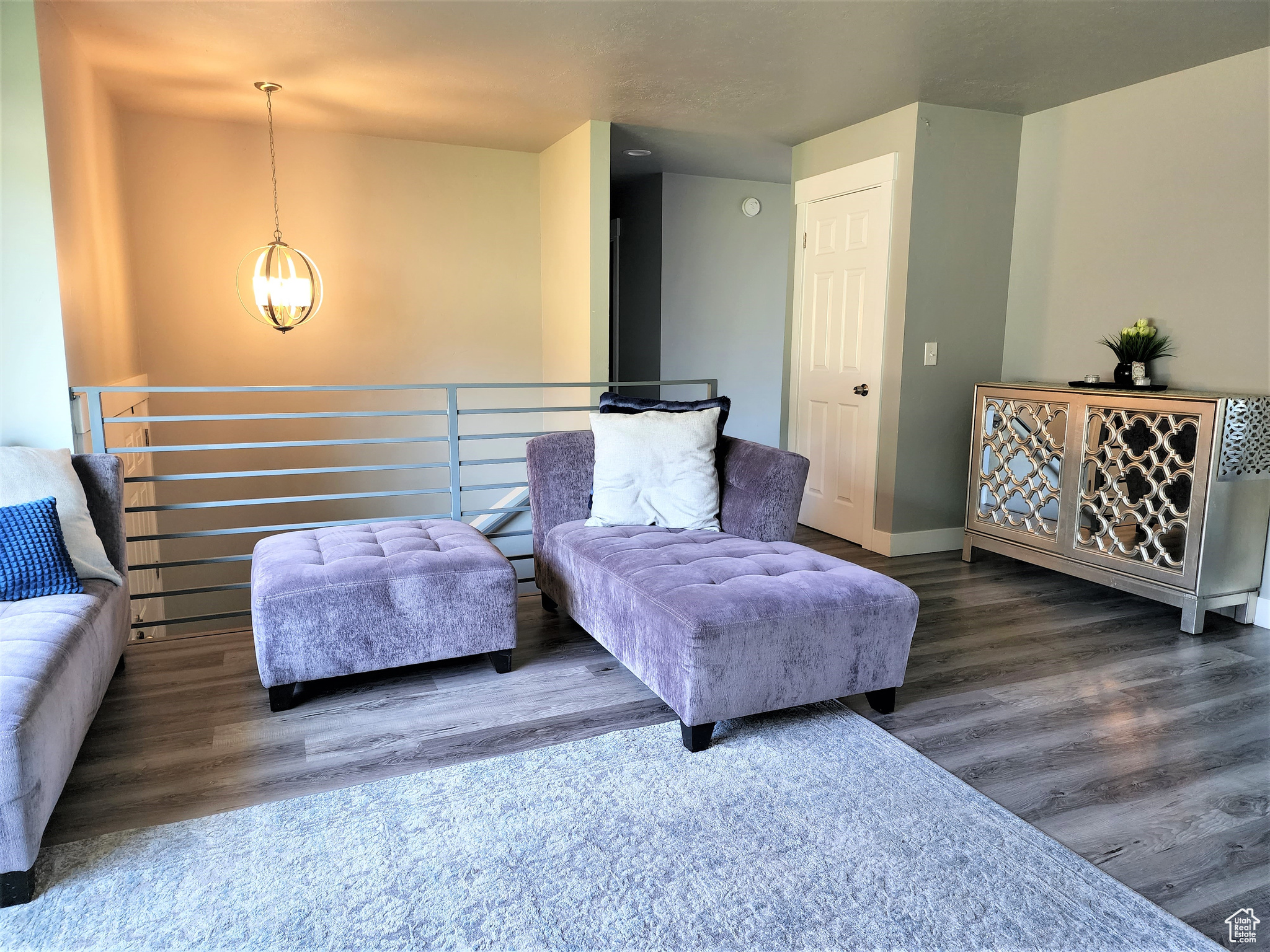 Interior space featuring a notable chandelier and hardwood / wood-style floors