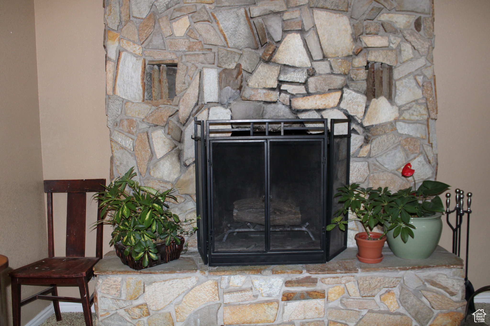 Details with a stone fireplace