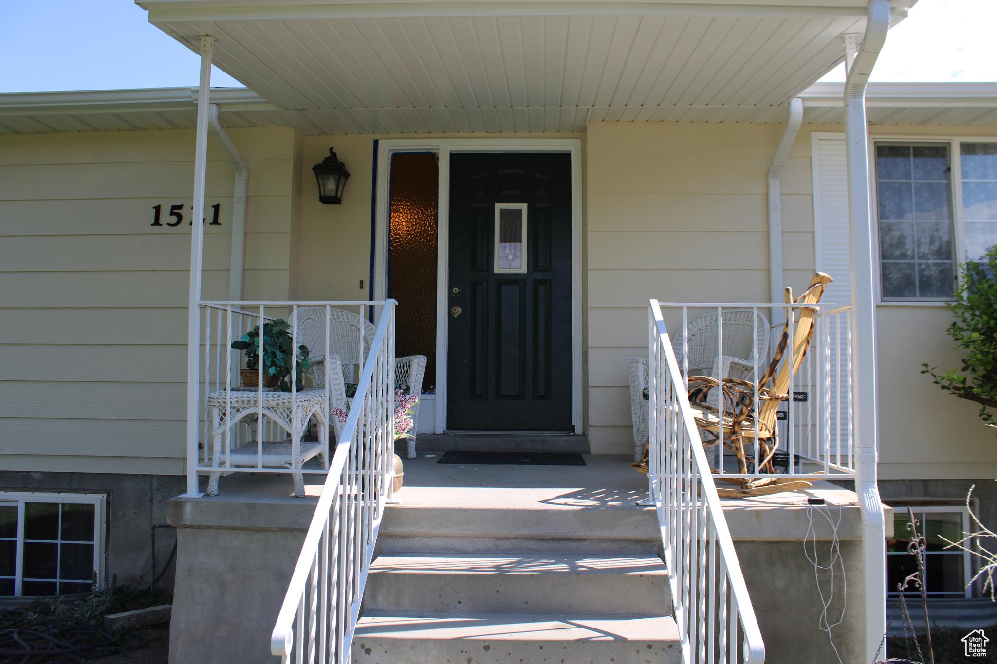 View of exterior entry featuring a porch