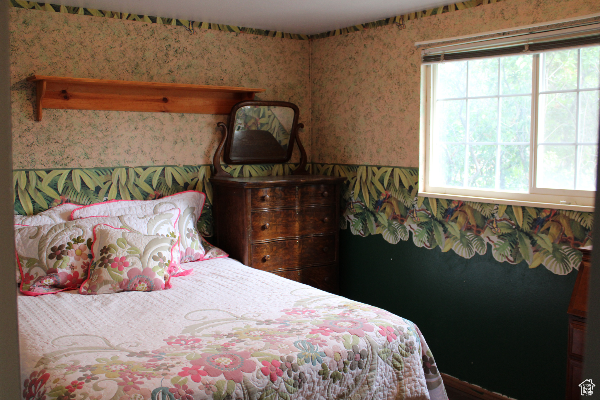 Bedroom featuring windows