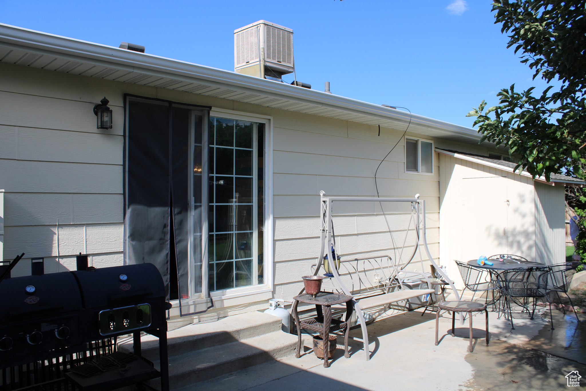 View of patio with extra storage.