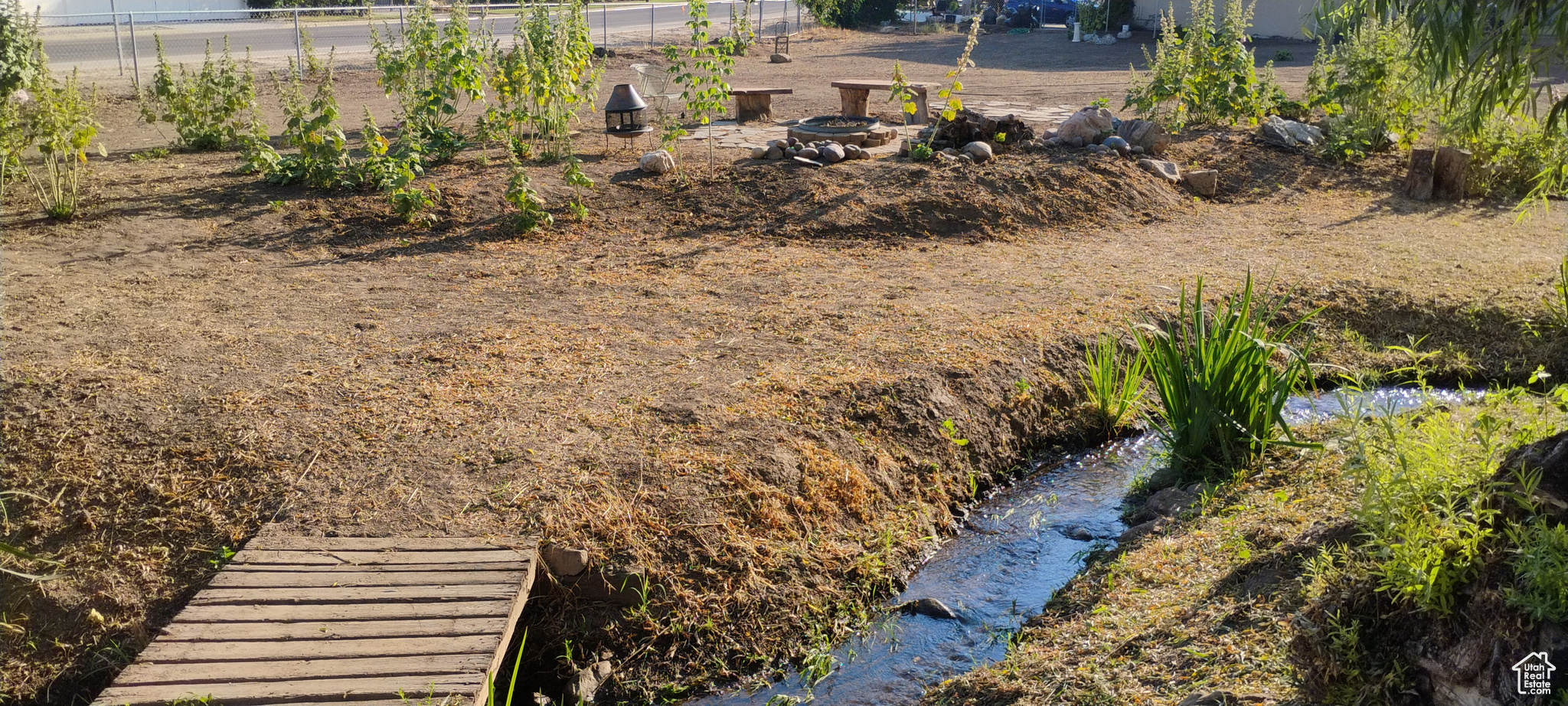 Stream and bridge to run over, firepit!