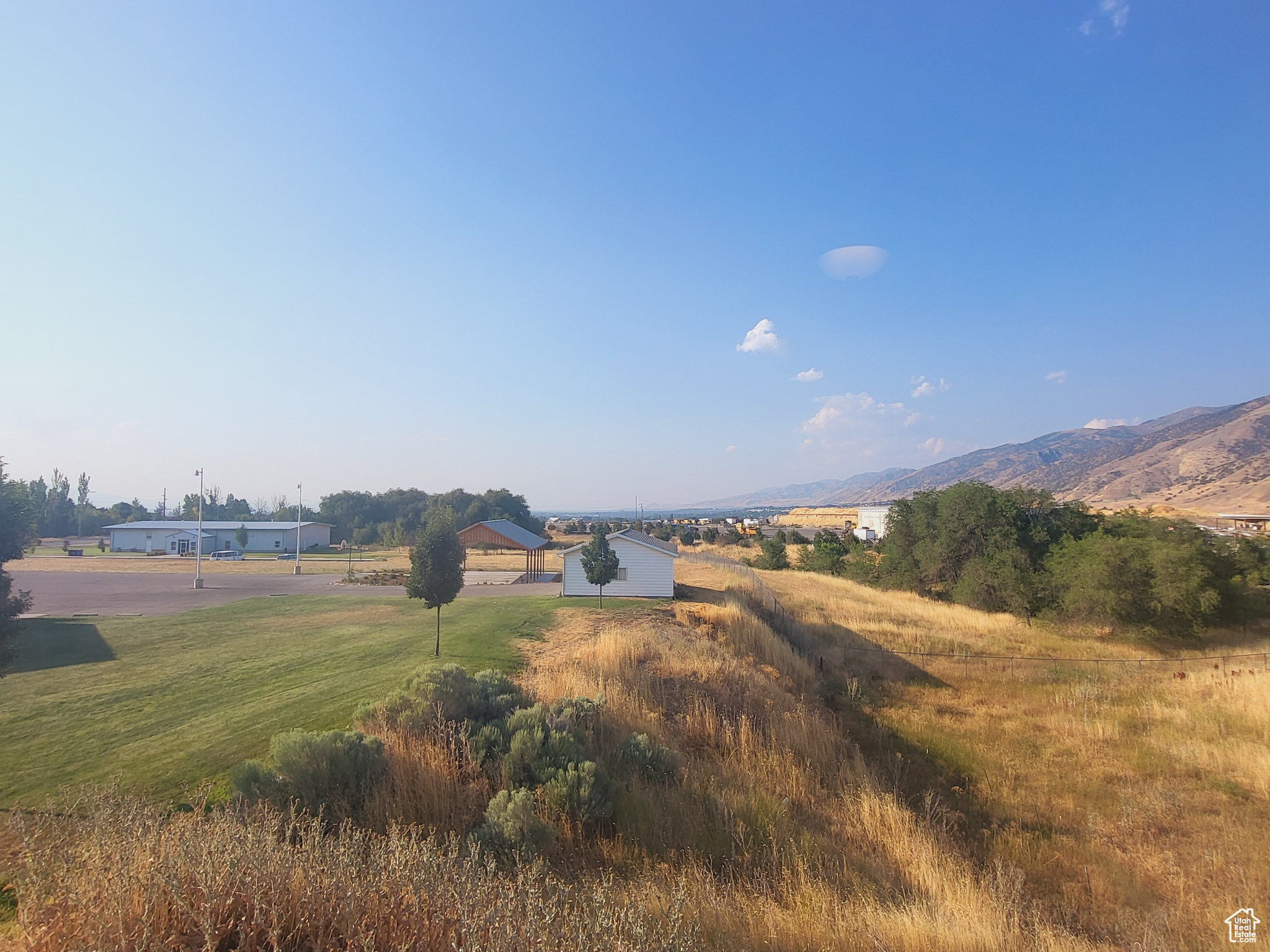 Property view of mountains with a rural view