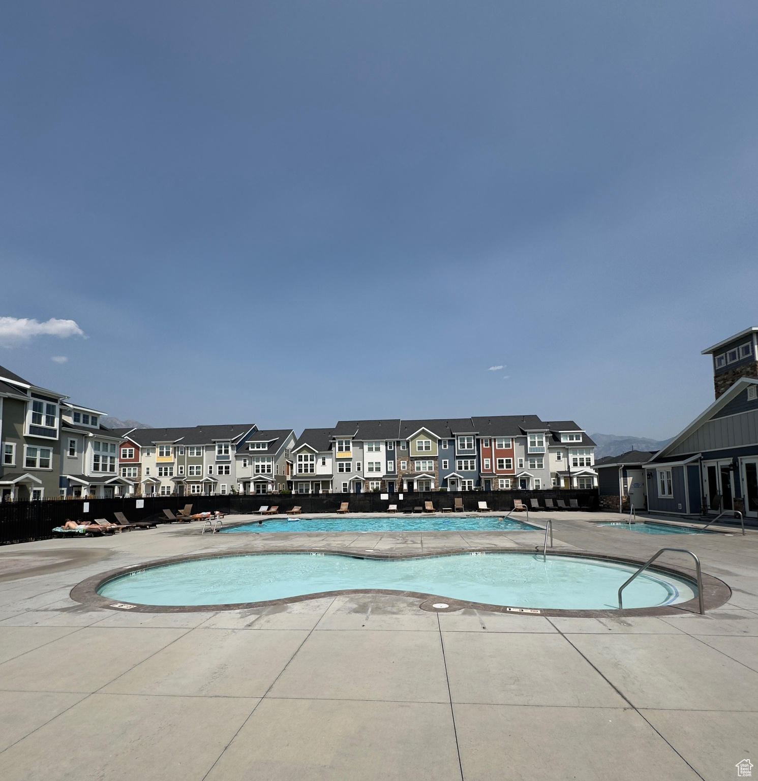 View of kids pool, large pool & hot tub