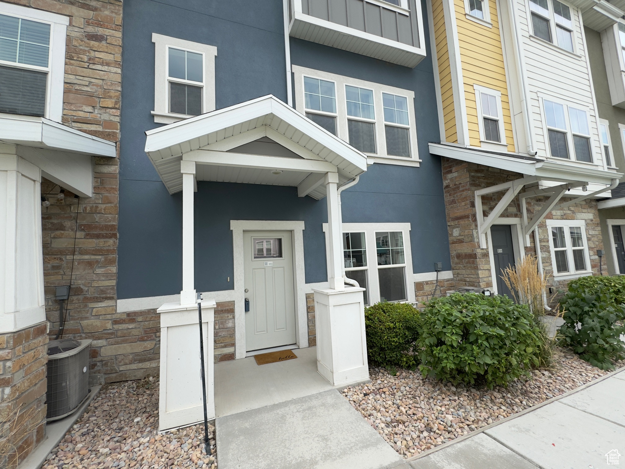 Property entrance featuring central AC