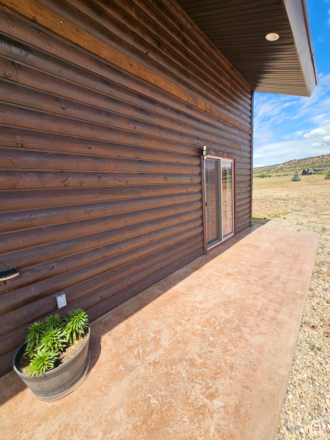 Front Patio w/sliding glass door to master bedroom!