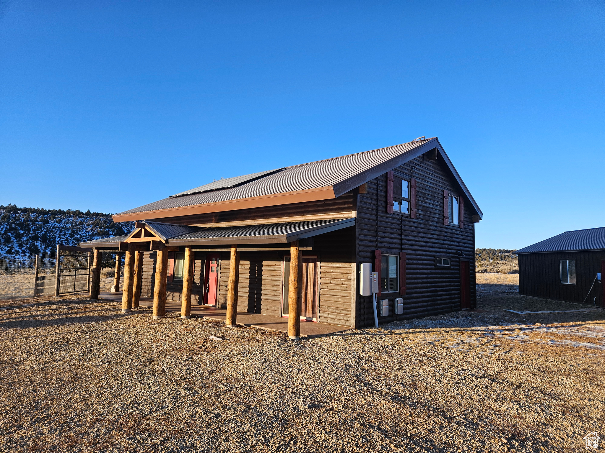 Brand new covered roof & log over front door!