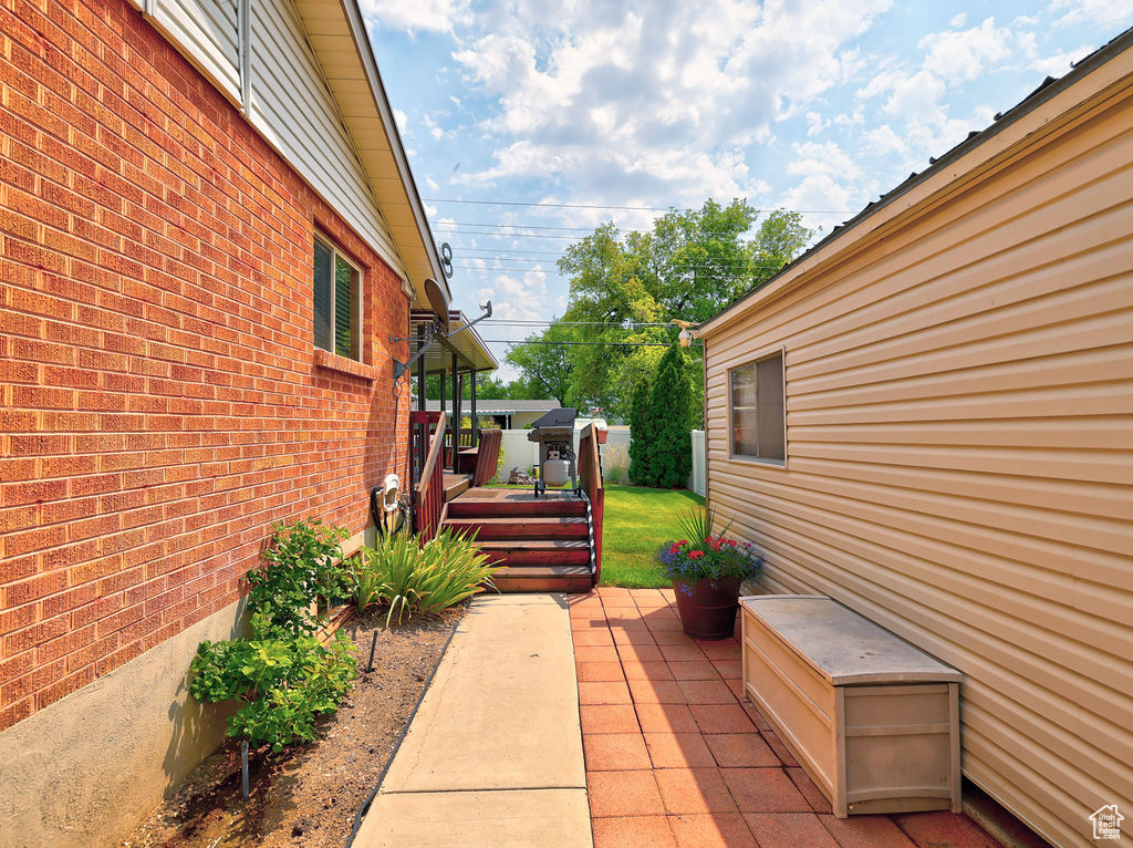 View of patio featuring a deck