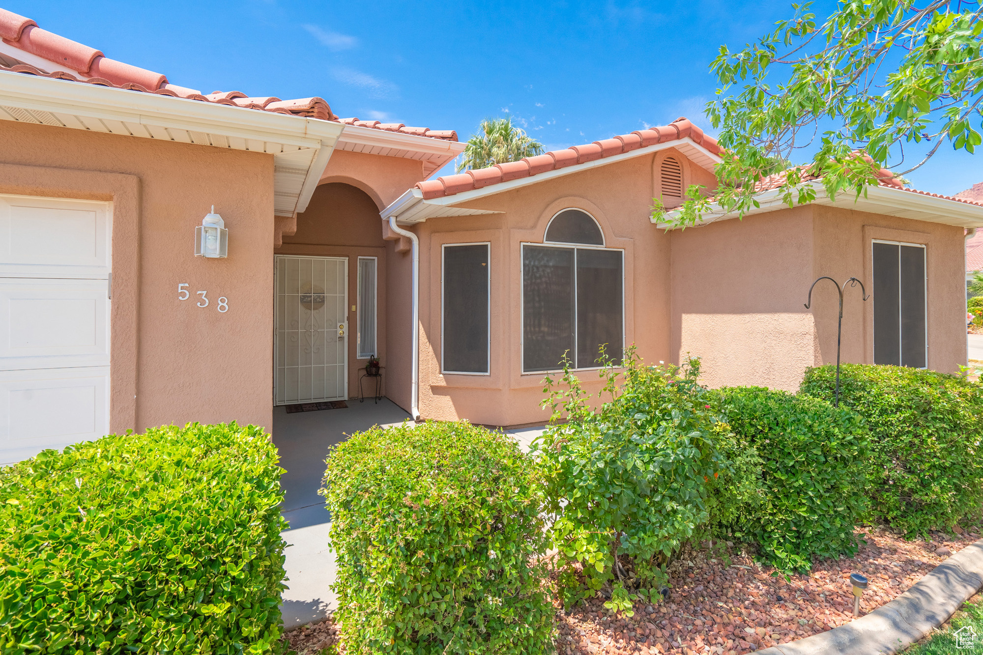 View of front of property with a garage