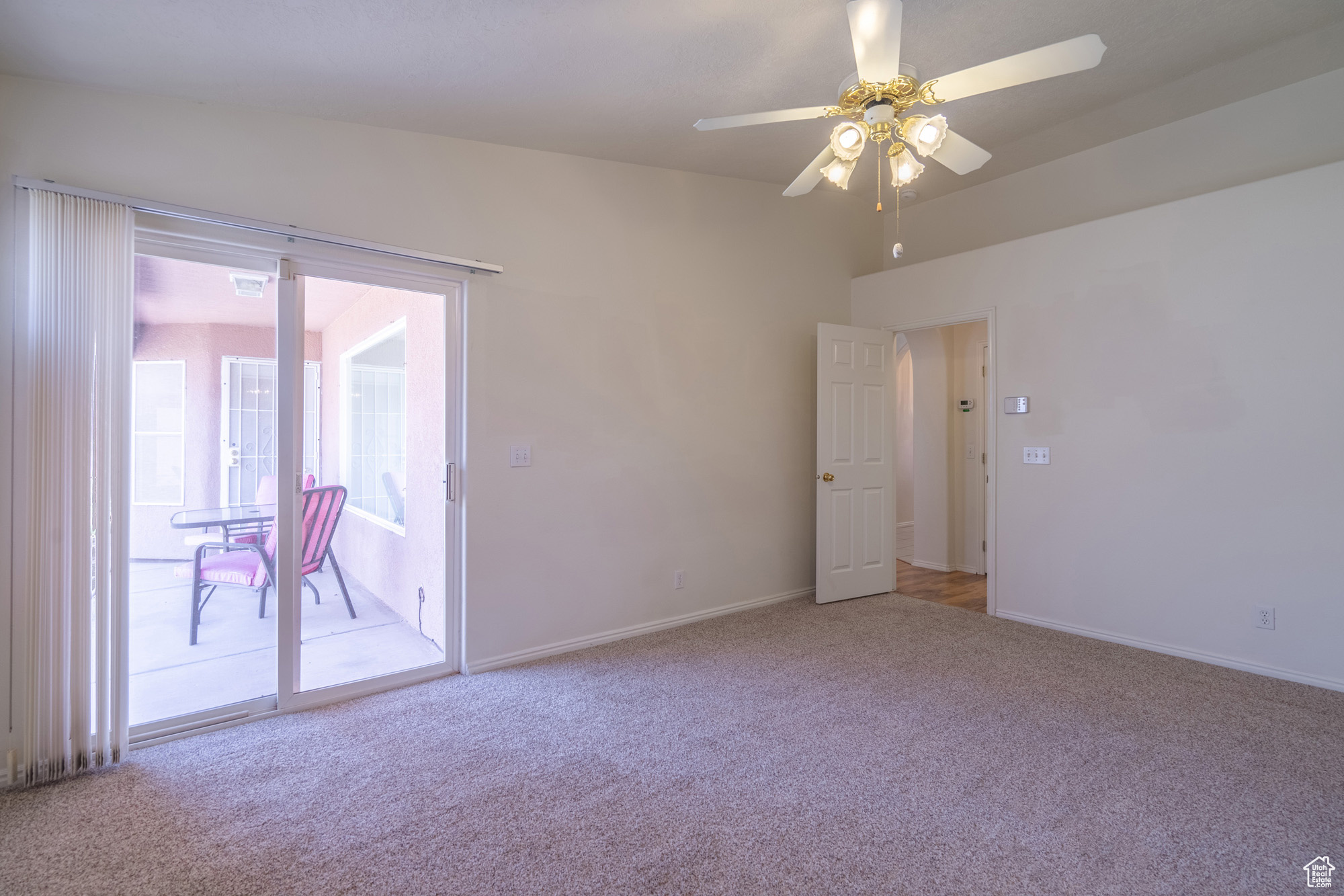 Primary bedroom with slider to patio