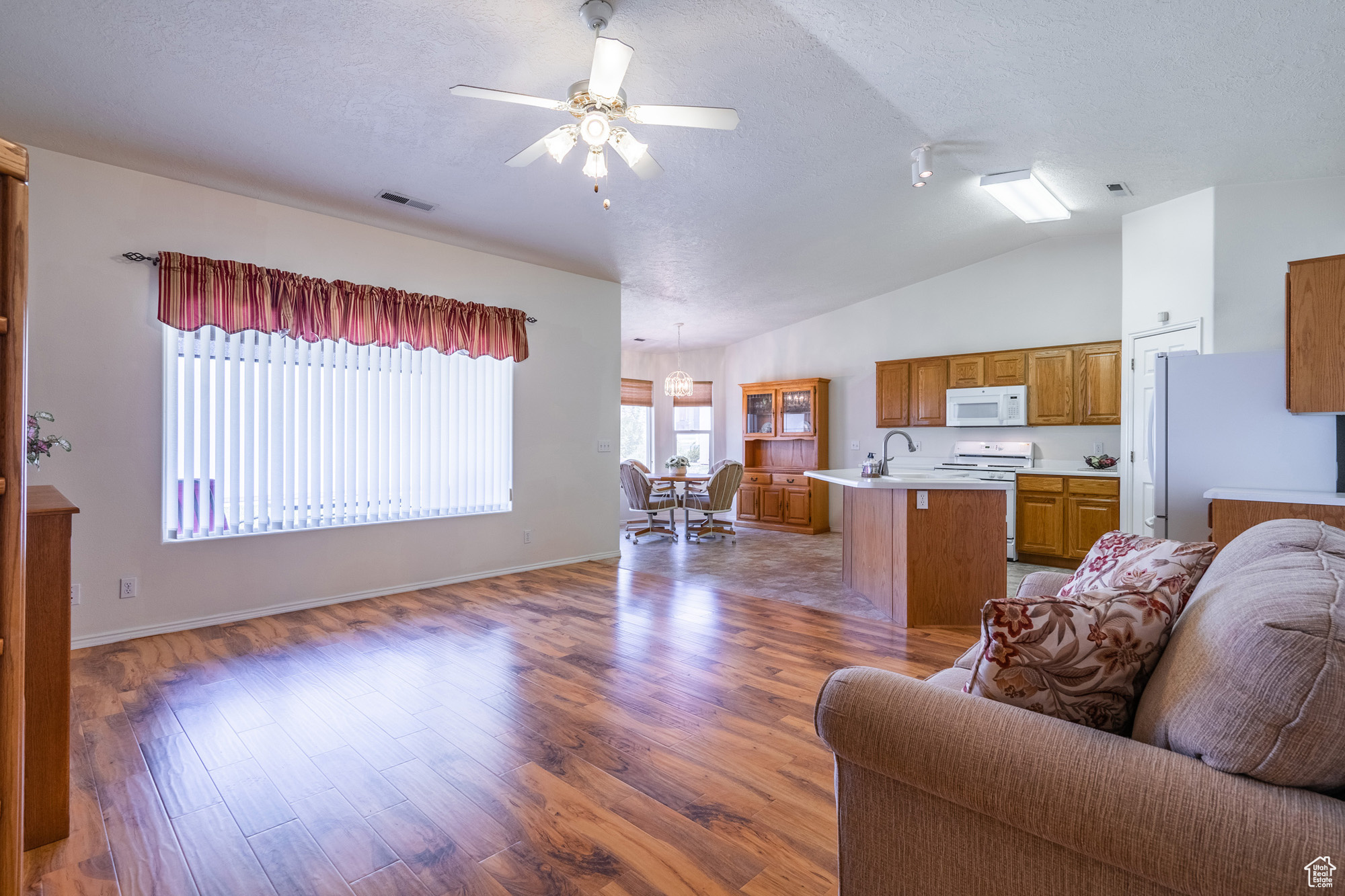 Great room with large picture window and lots of natural light.