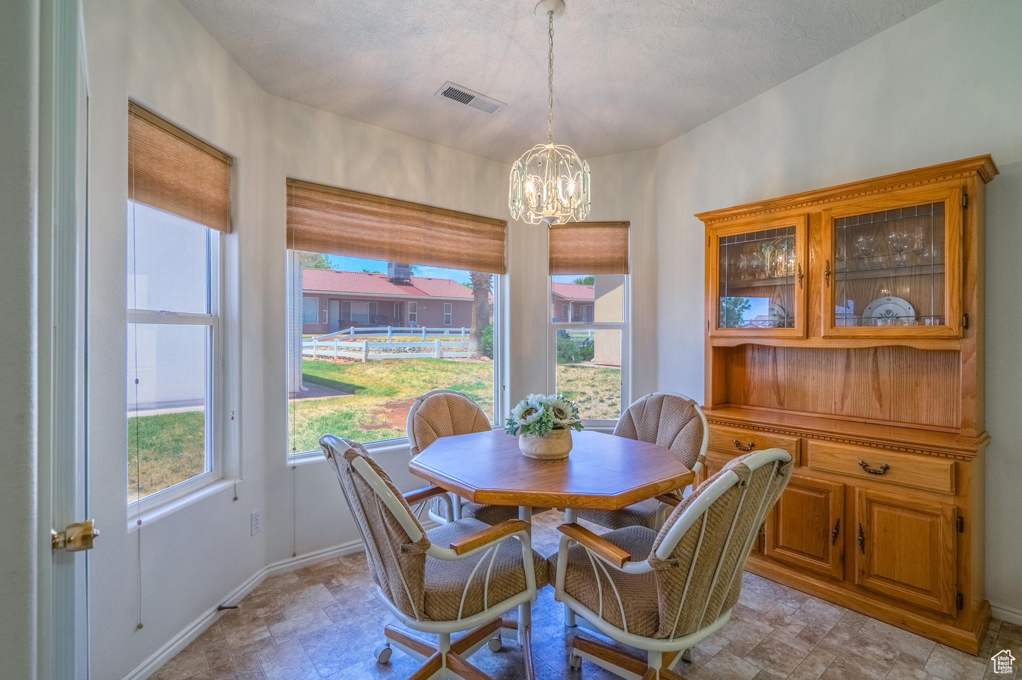 Dining space with an inviting chandelier