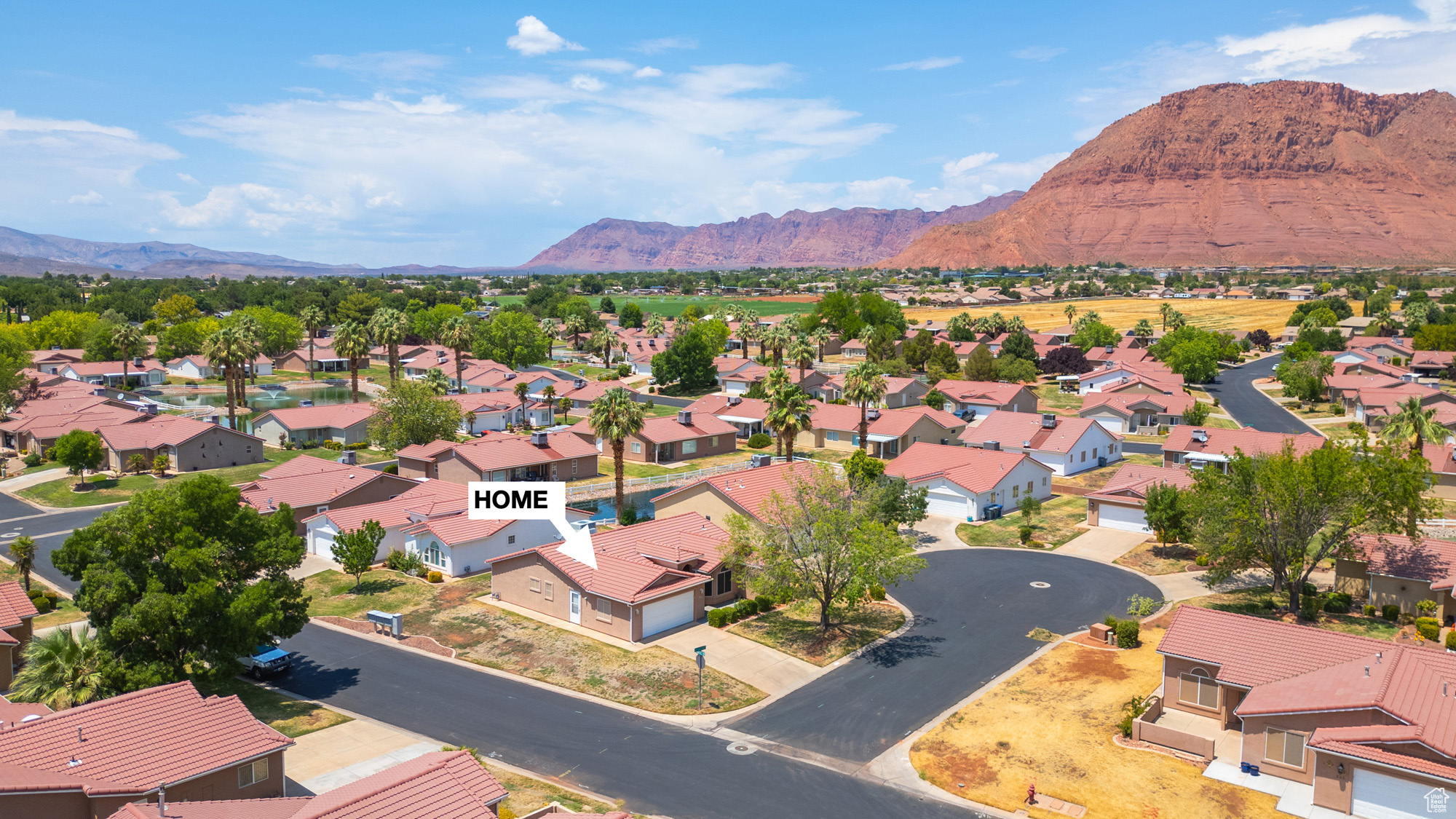 Birds eye view of property featuring a mountain view