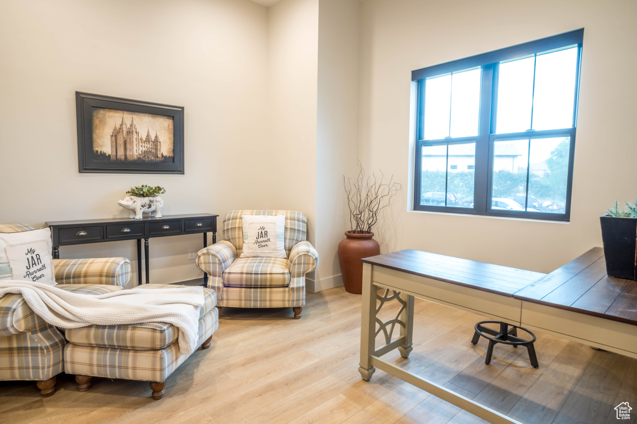 Office area featuring light hardwood / wood-style floors