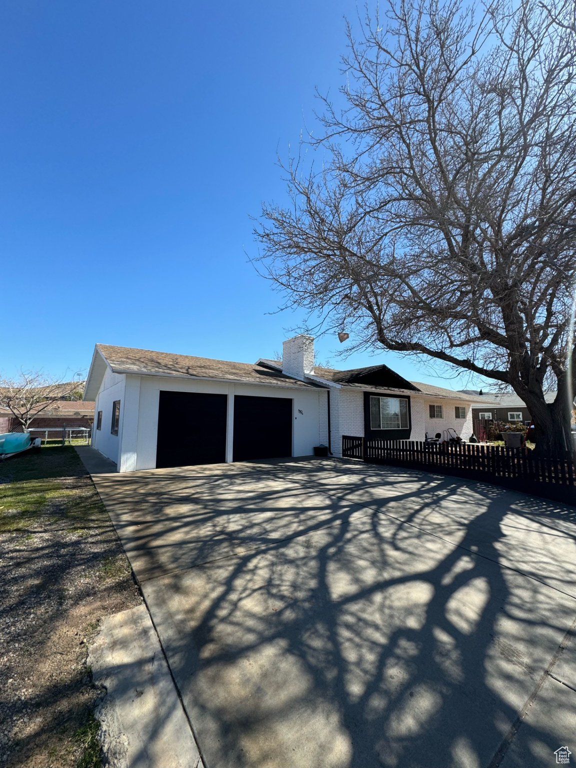 Ranch-style home with a garage