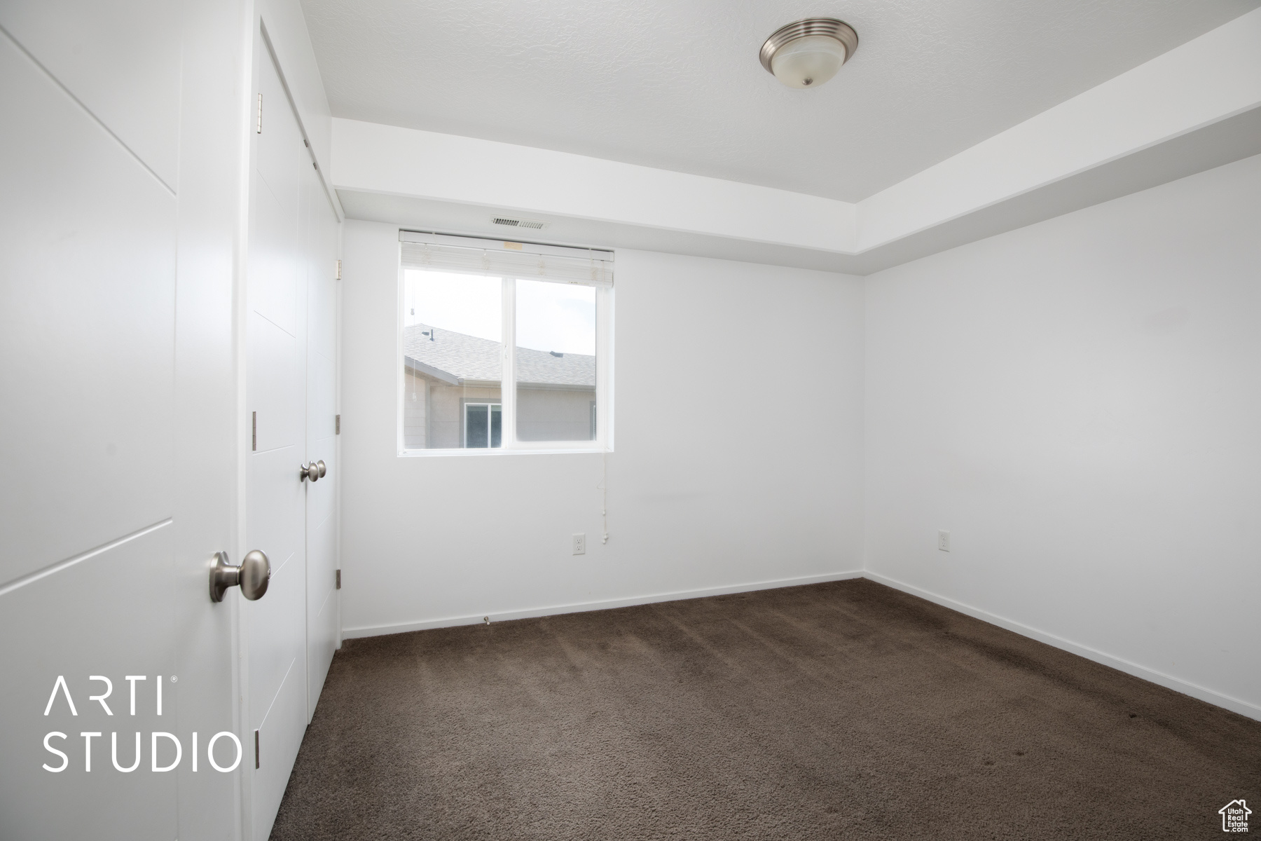 View of carpeted spare room