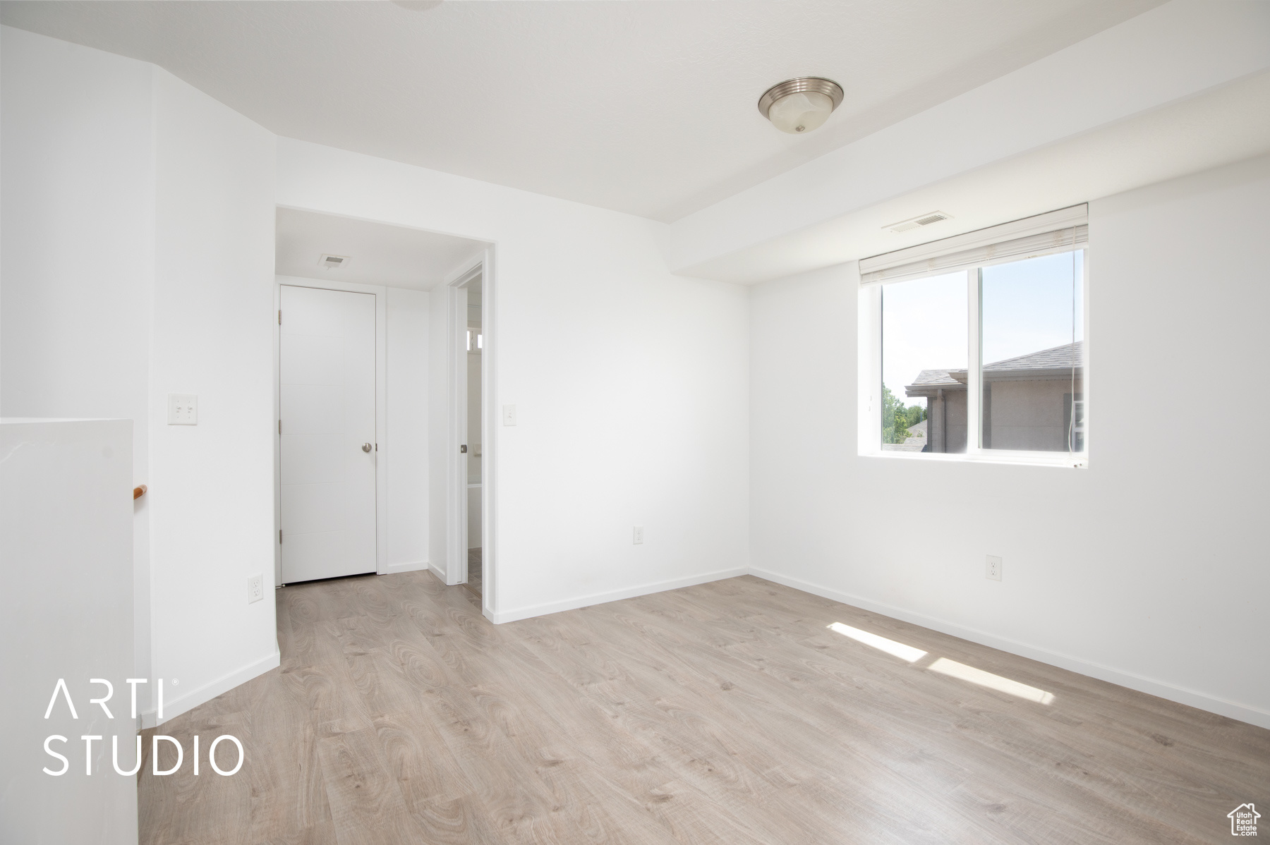 Unfurnished room featuring light hardwood / wood-style floors