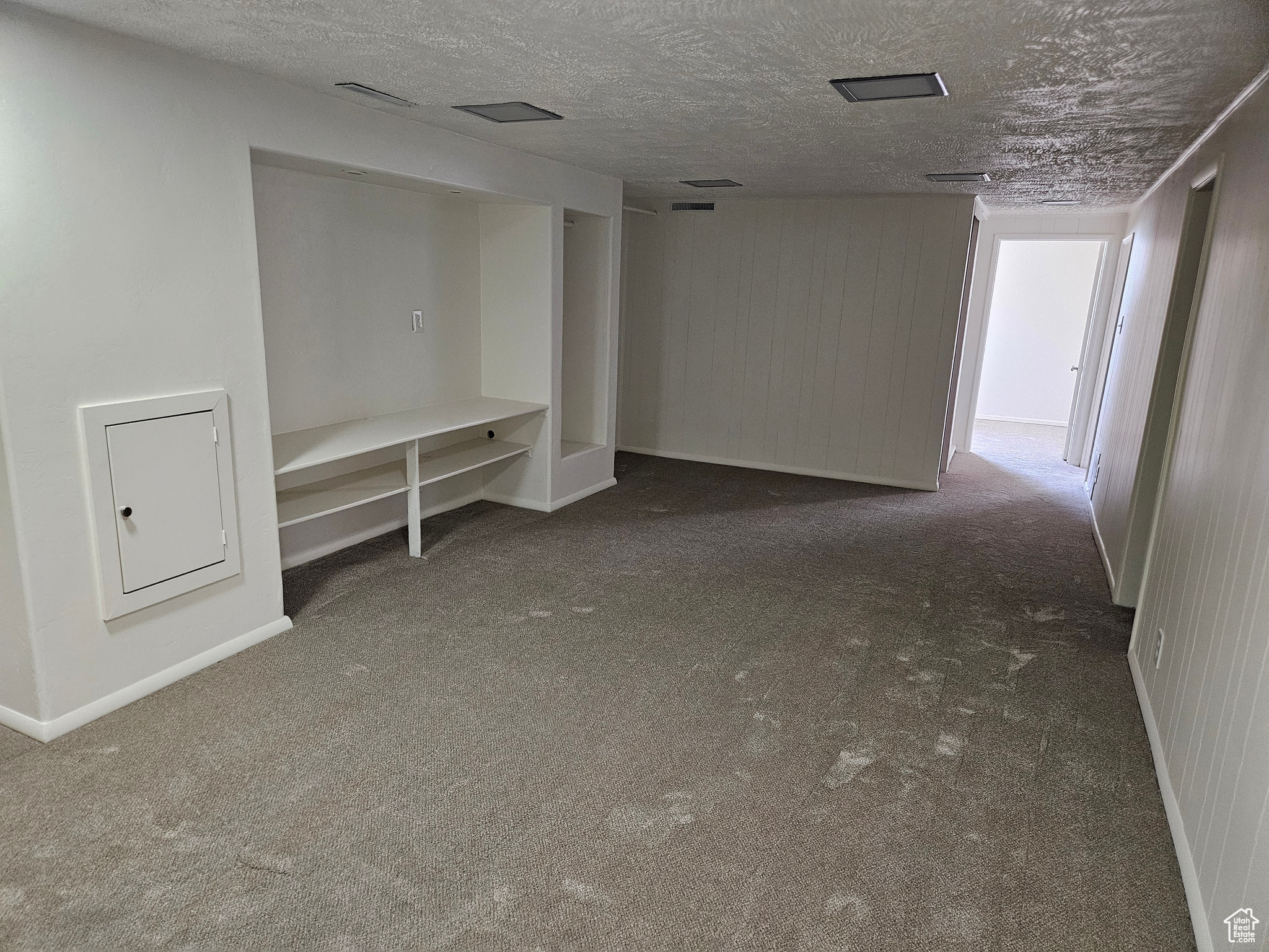 Interior space with a textured ceiling