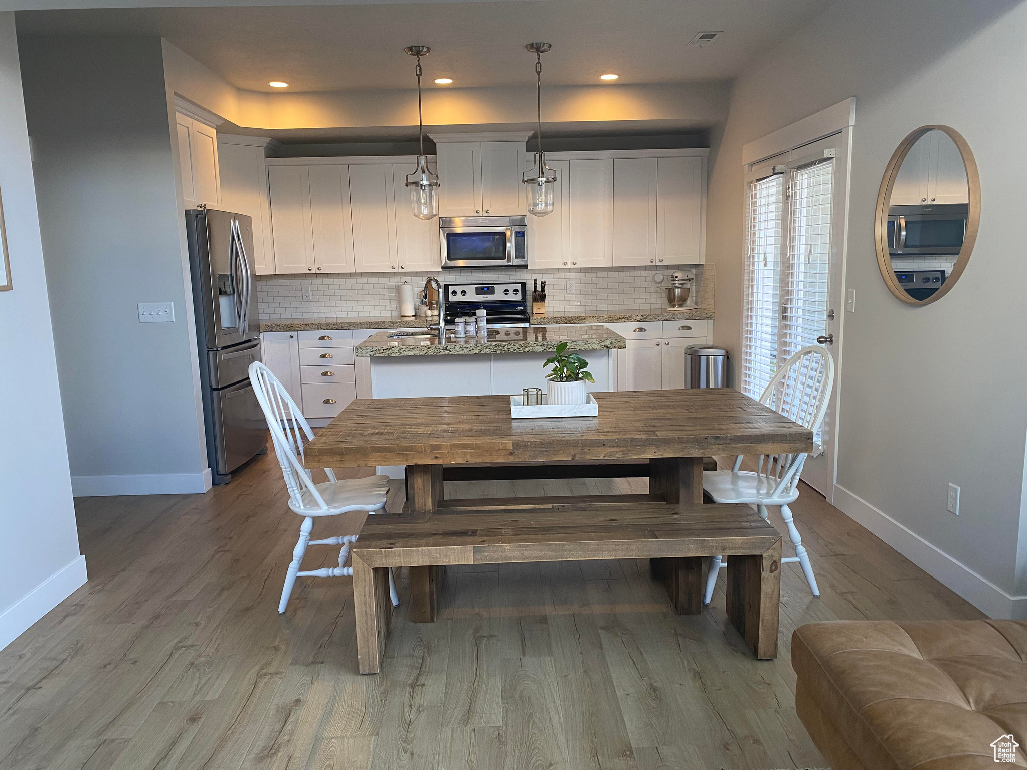 Dining area featuring light hardwood / wood-style flooring