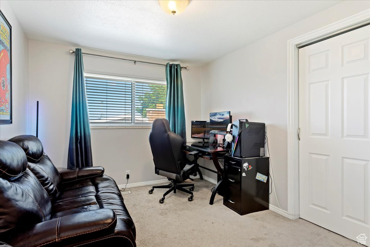 View of carpeted home office