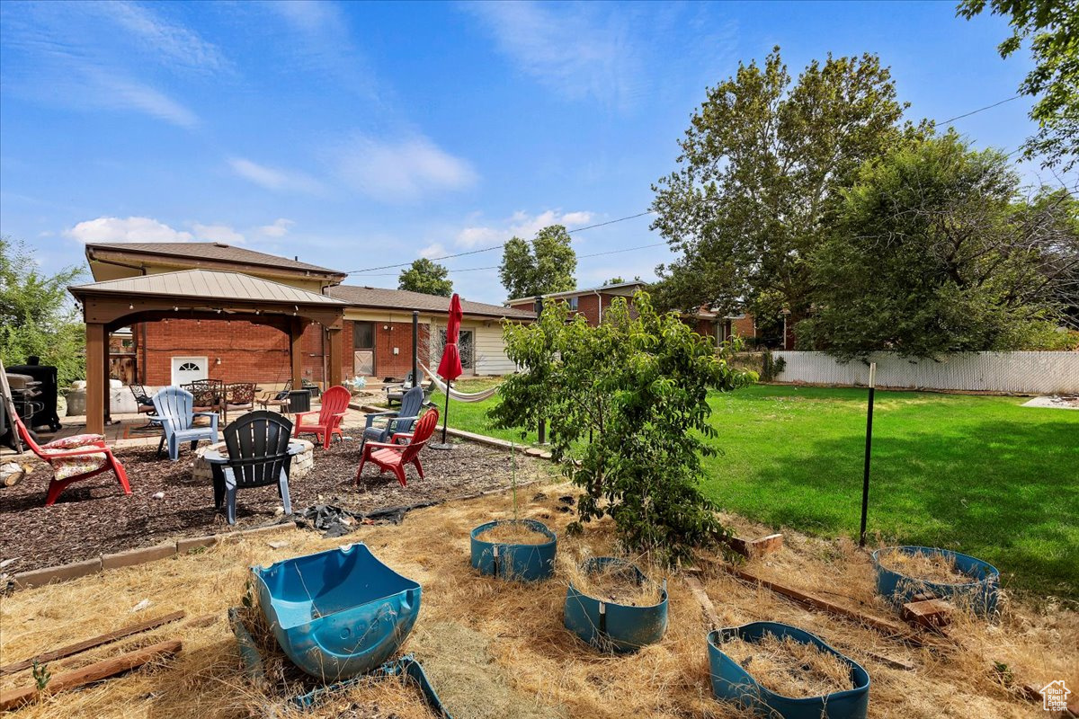 View of yard with a patio