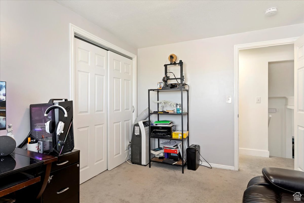 View of carpeted home office