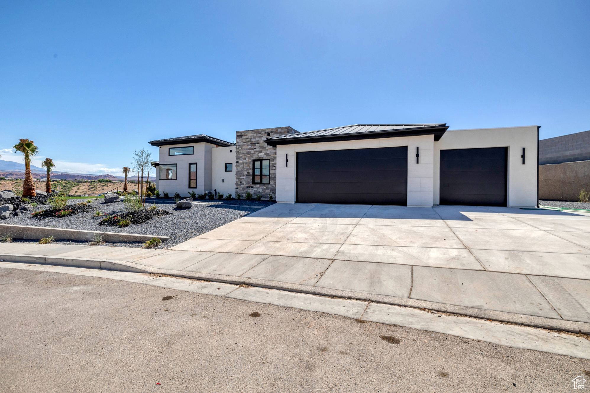 View of front of home featuring a garage