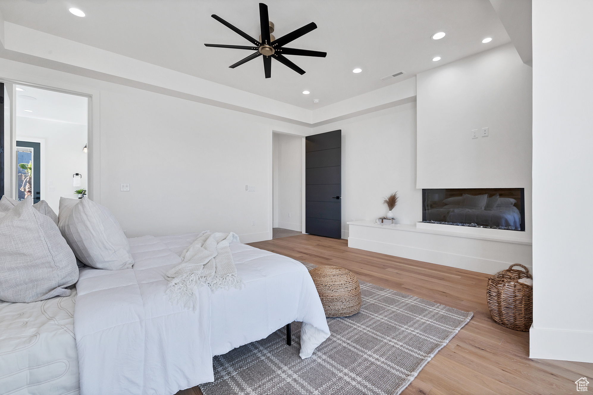 Bedroom with light wood-type flooring and ceiling fan