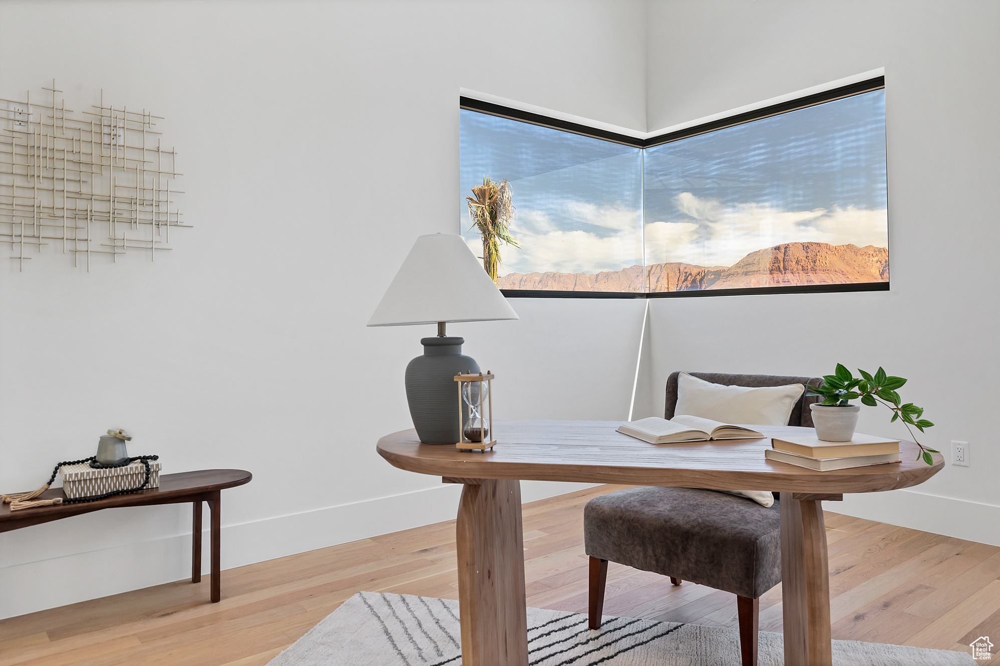 Office area with light wood-type flooring