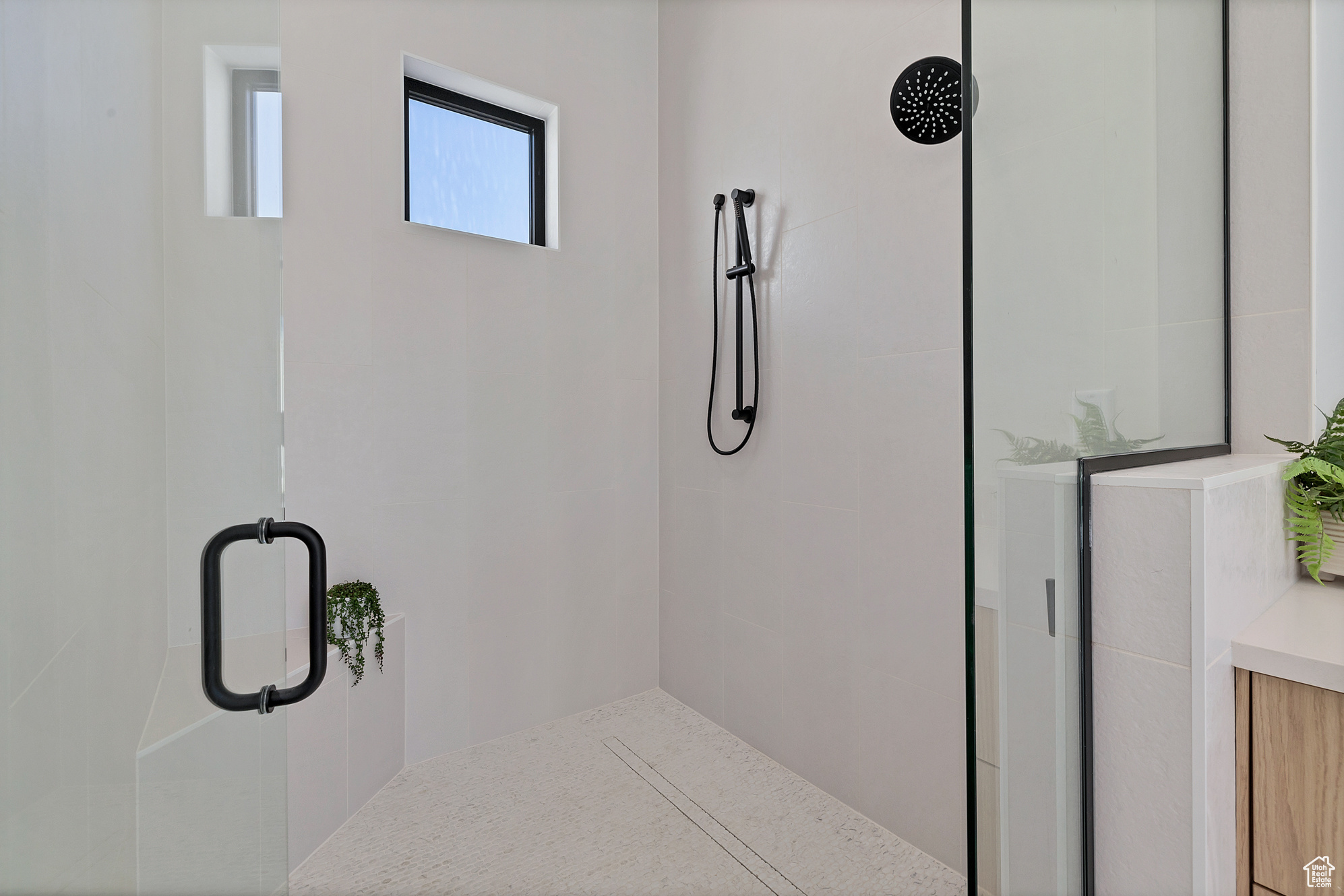 Bathroom with an enclosed shower