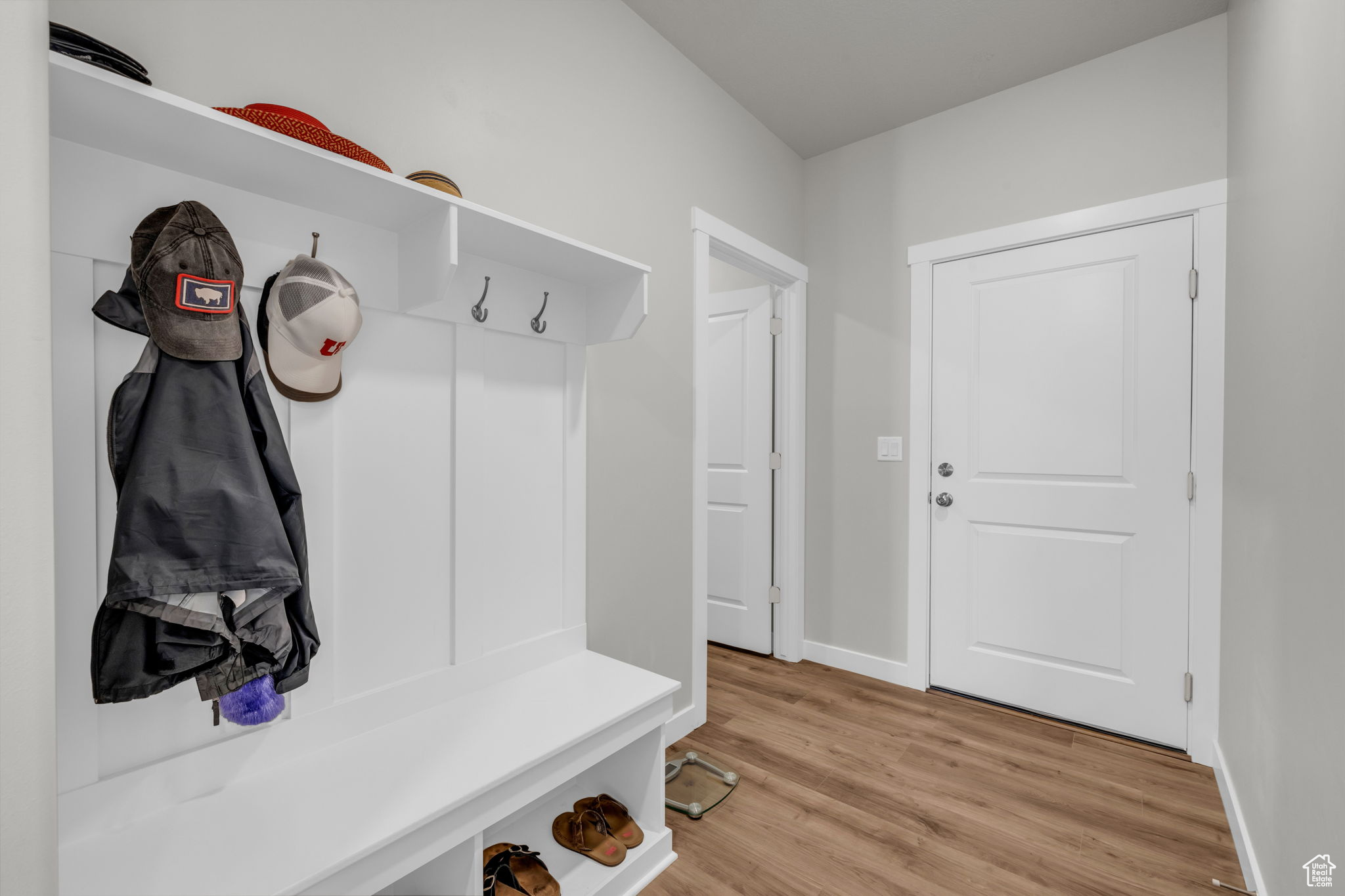 Mudroom with light wood-type flooring