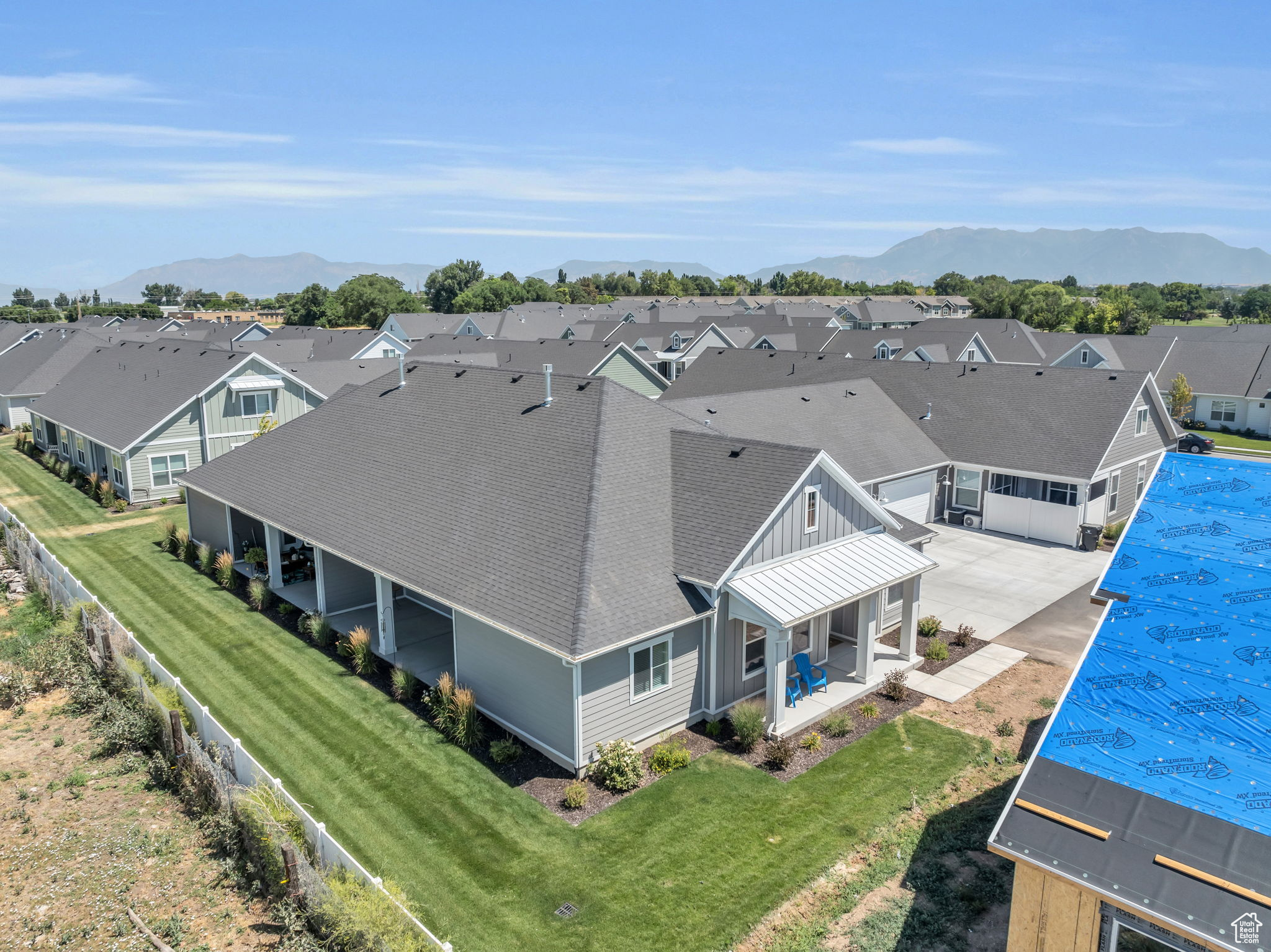 Birds eye view of property with a mountain view