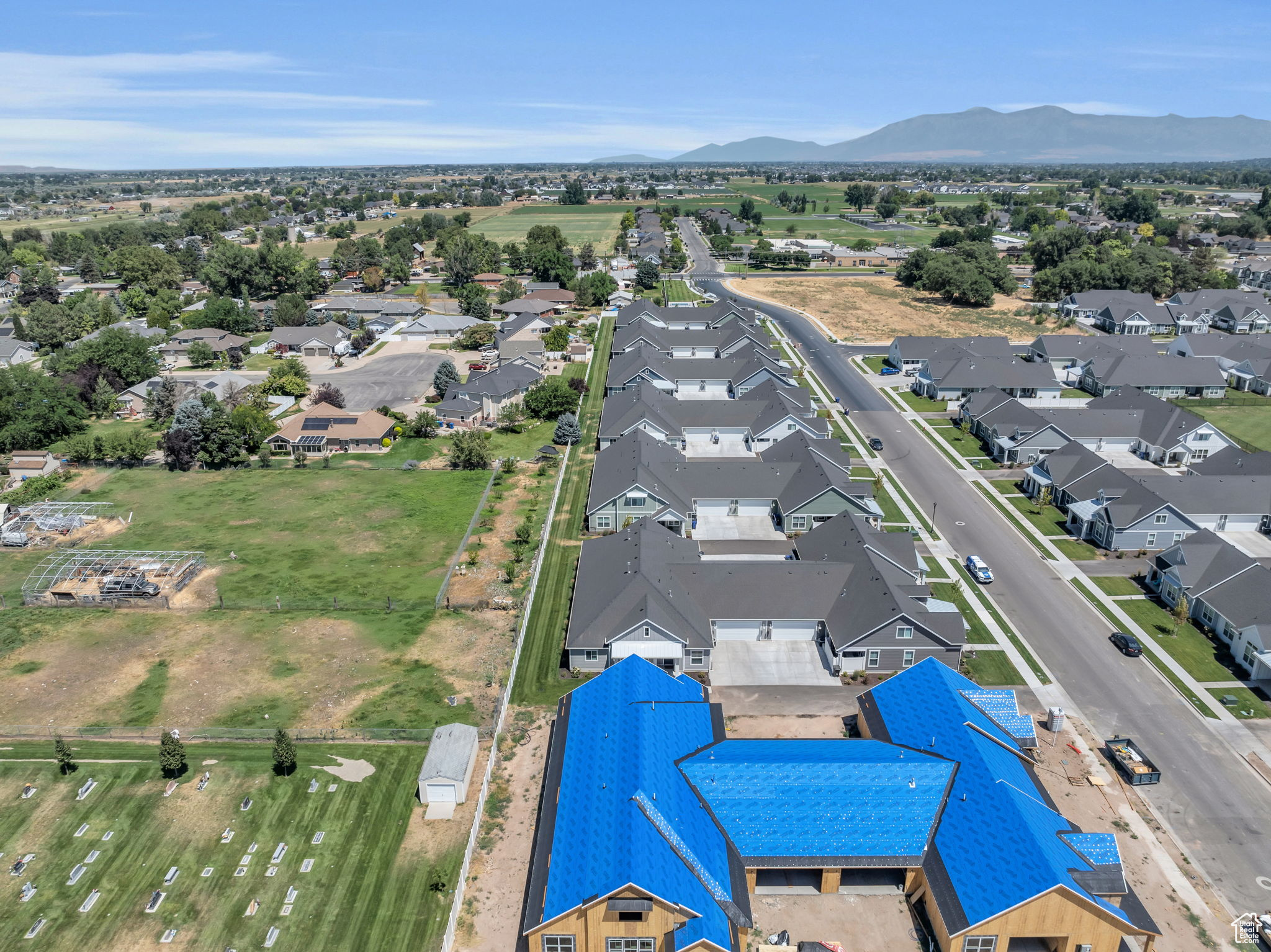 Birds eye view of property with a mountain view