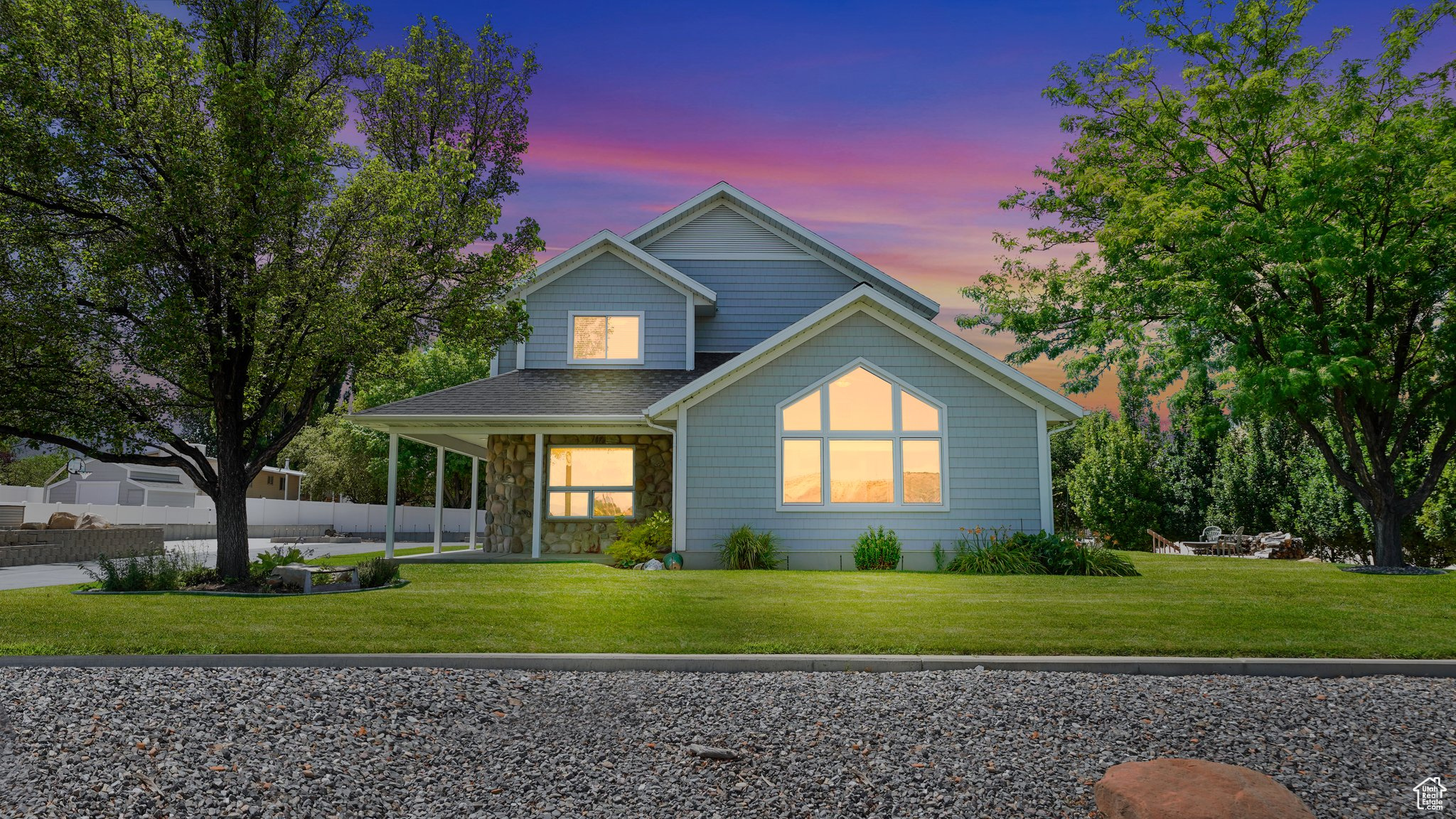 View of front of house featuring a yard