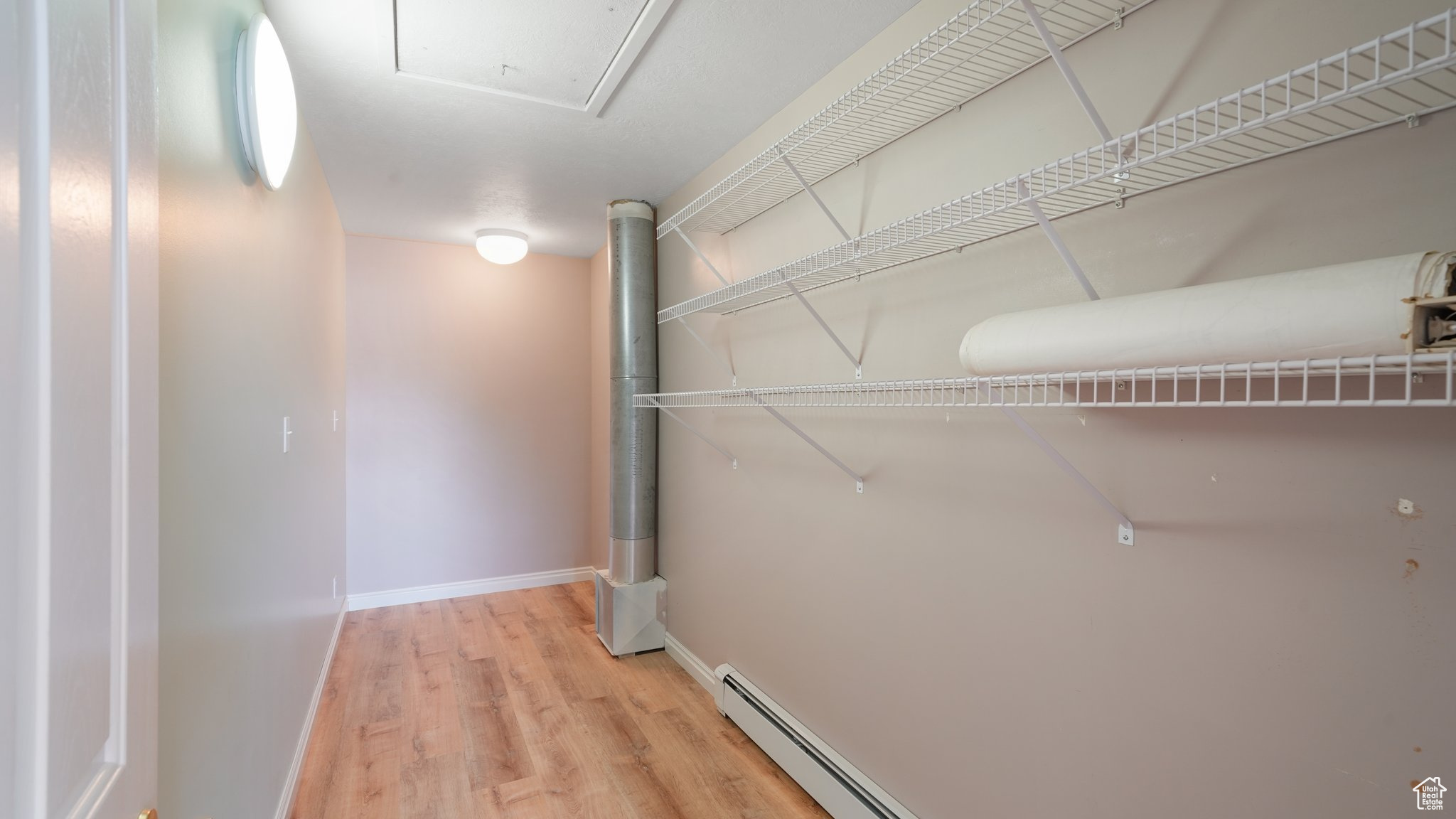 Interior space with light hardwood / wood-style flooring