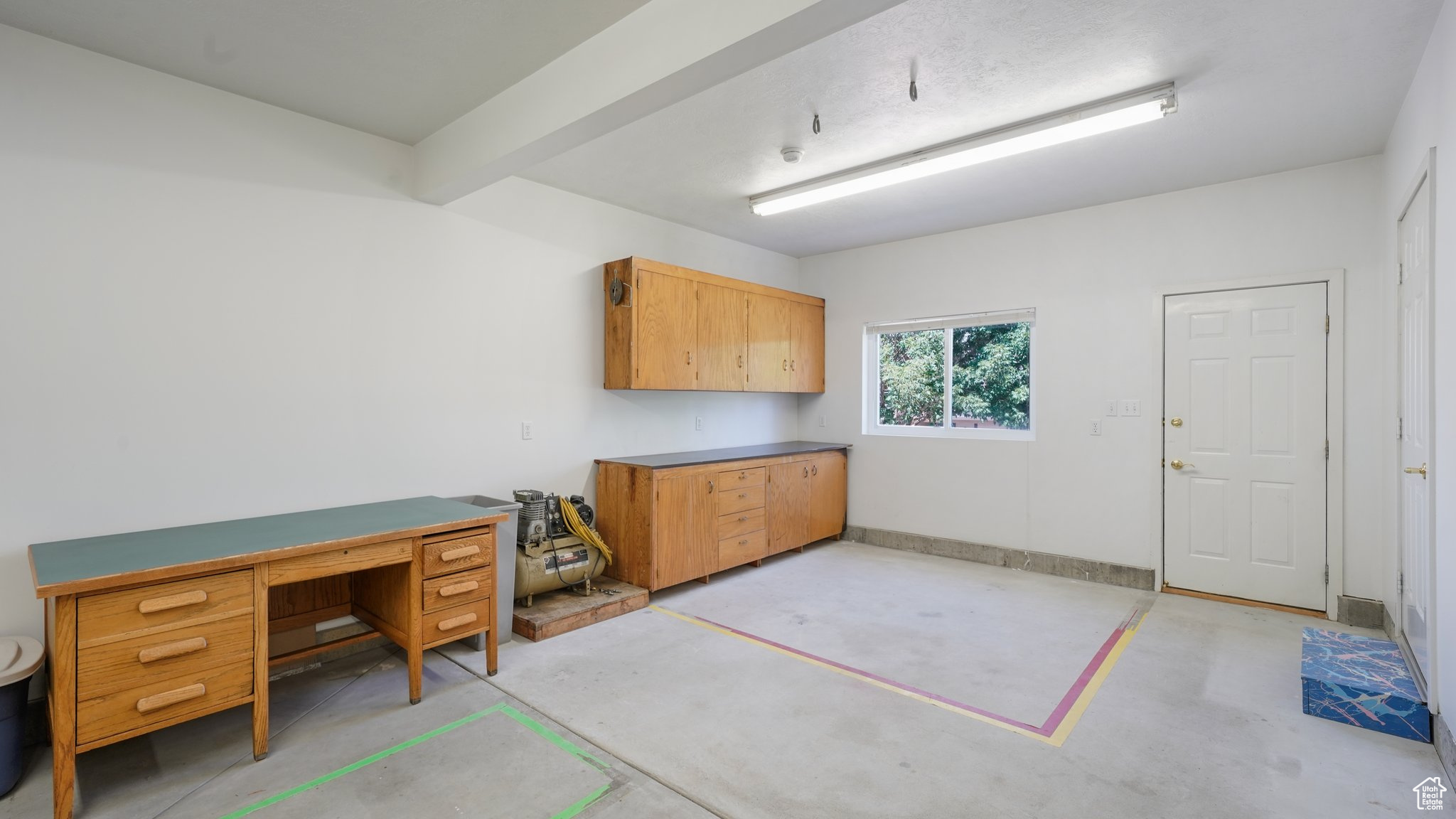 Garage with workbench and storage