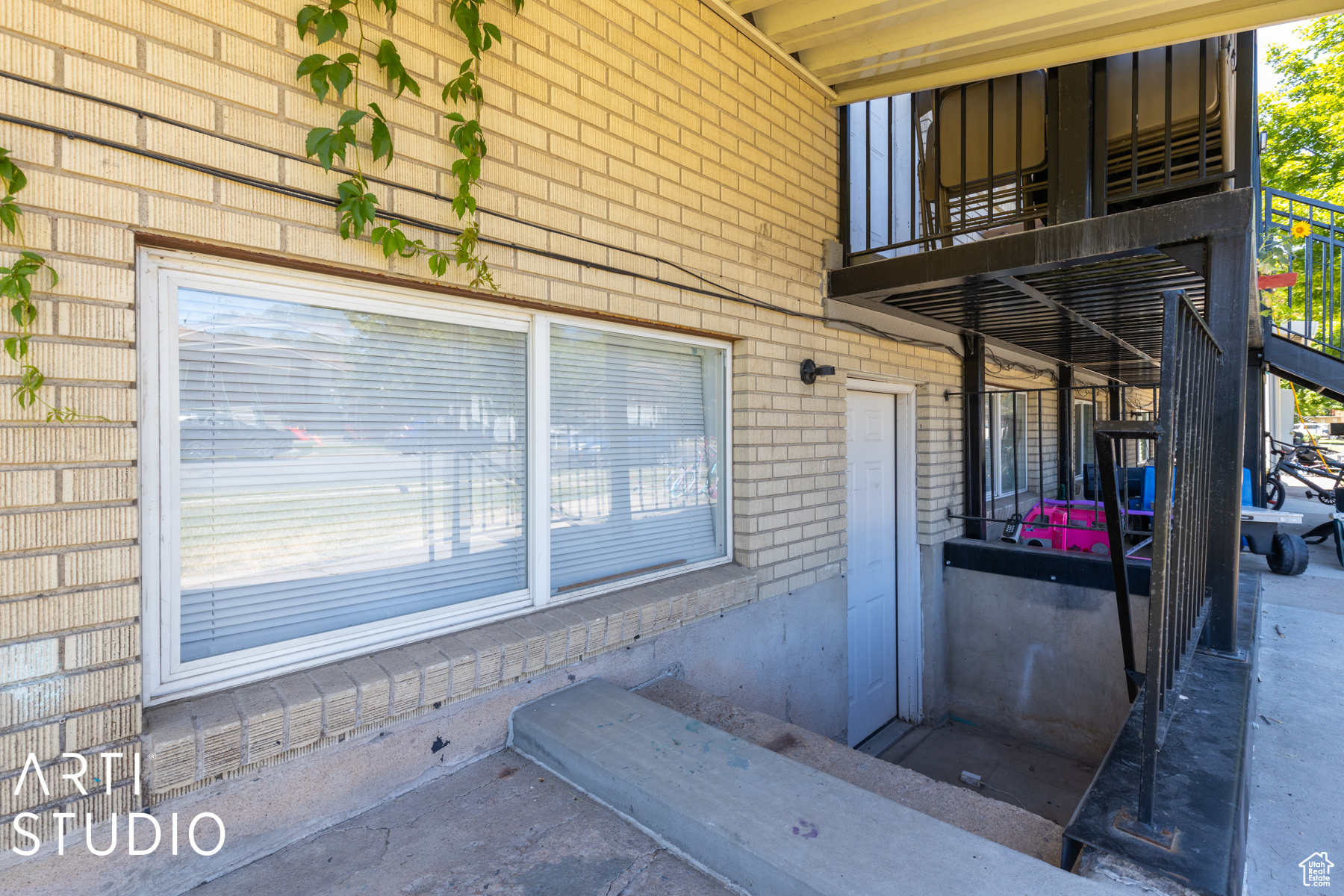 Doorway to property with a balcony