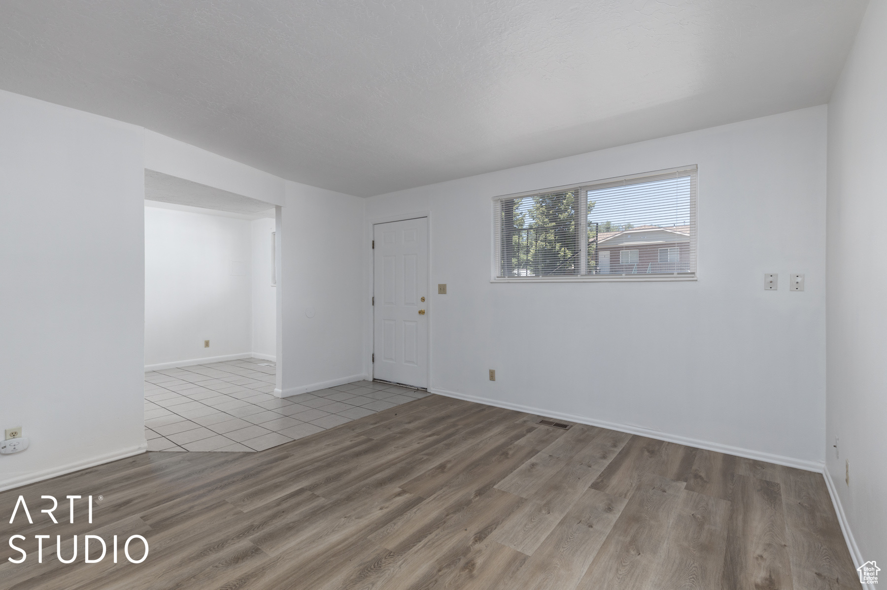 Unfurnished room featuring hardwood / wood-style floors