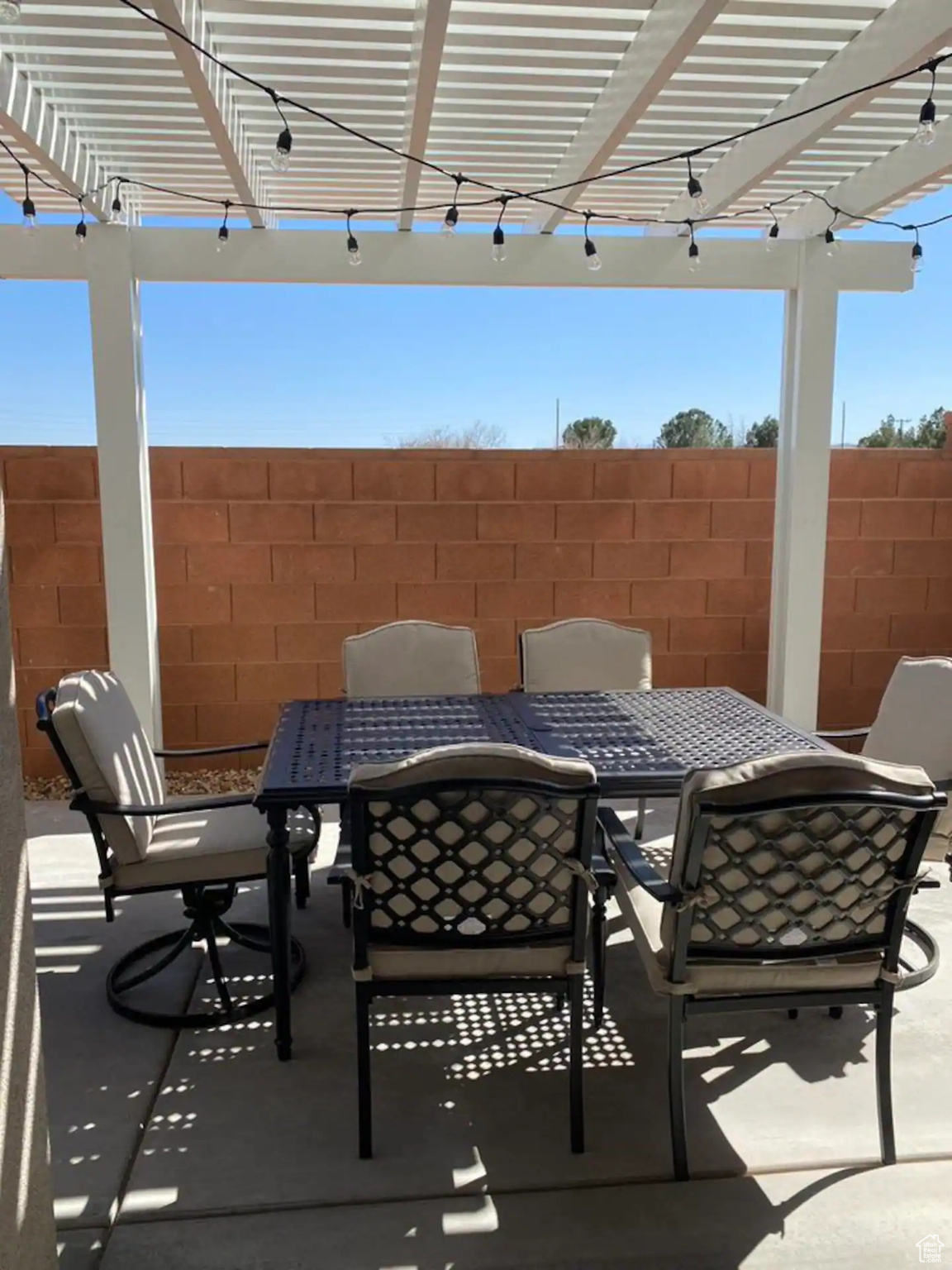 View of patio featuring a pergola