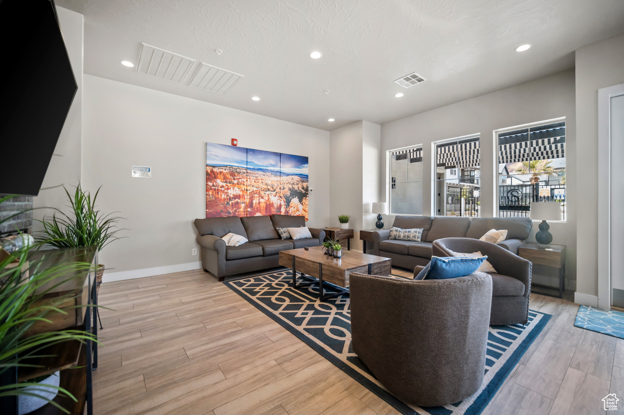 Living room with light wood-type flooring