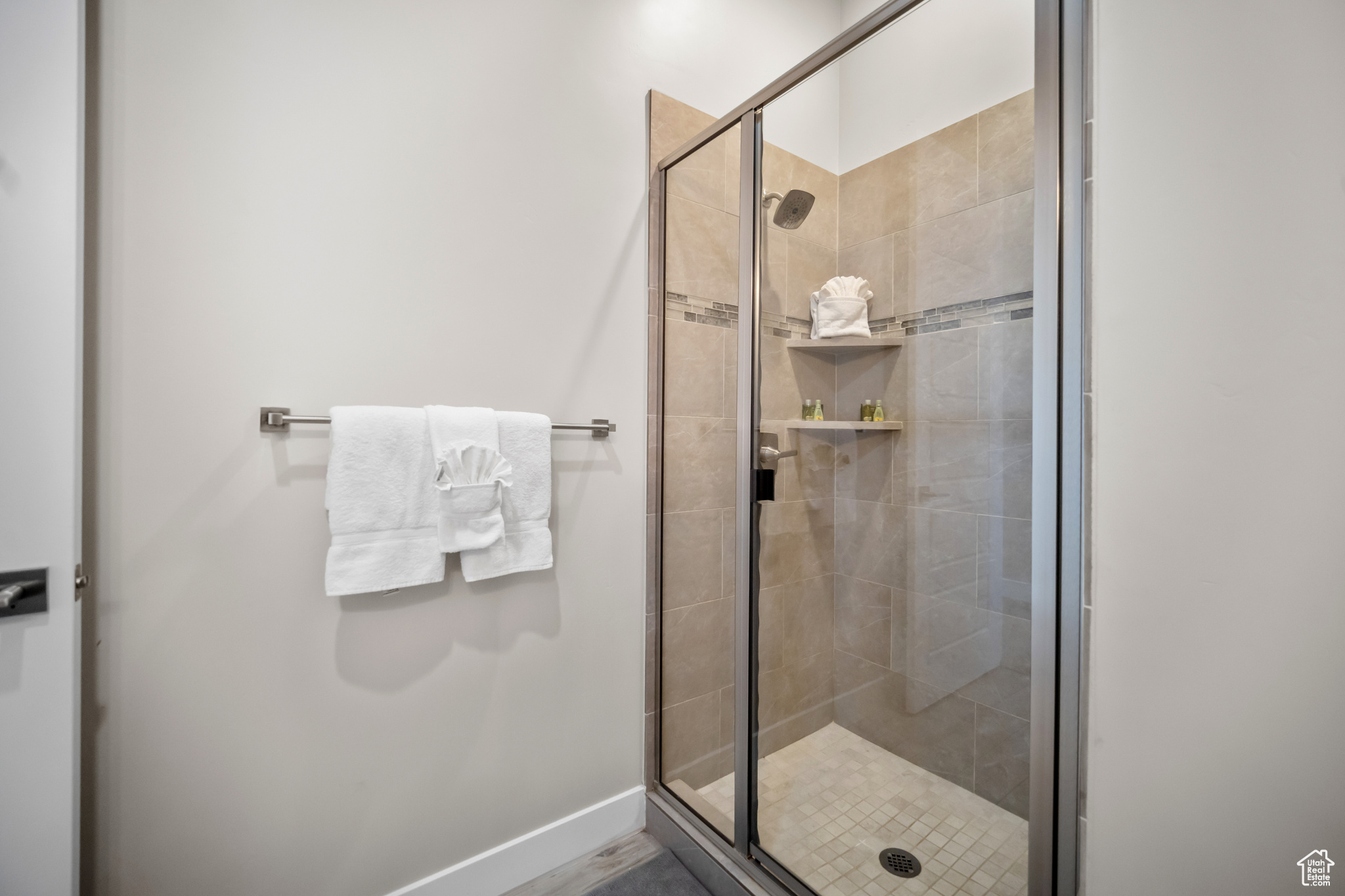 Bathroom featuring a shower with shower door