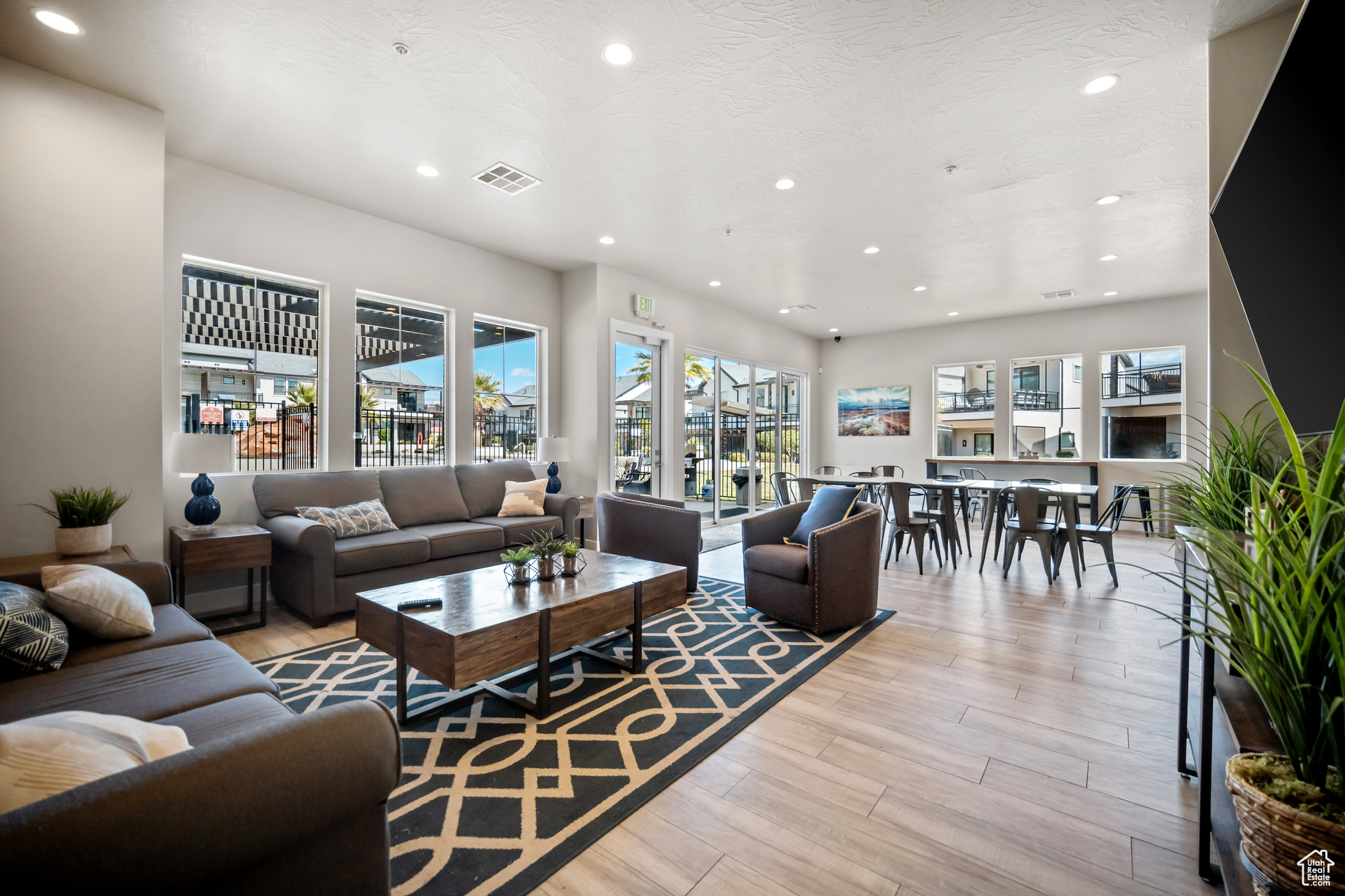 Living room with light hardwood / wood-style flooring