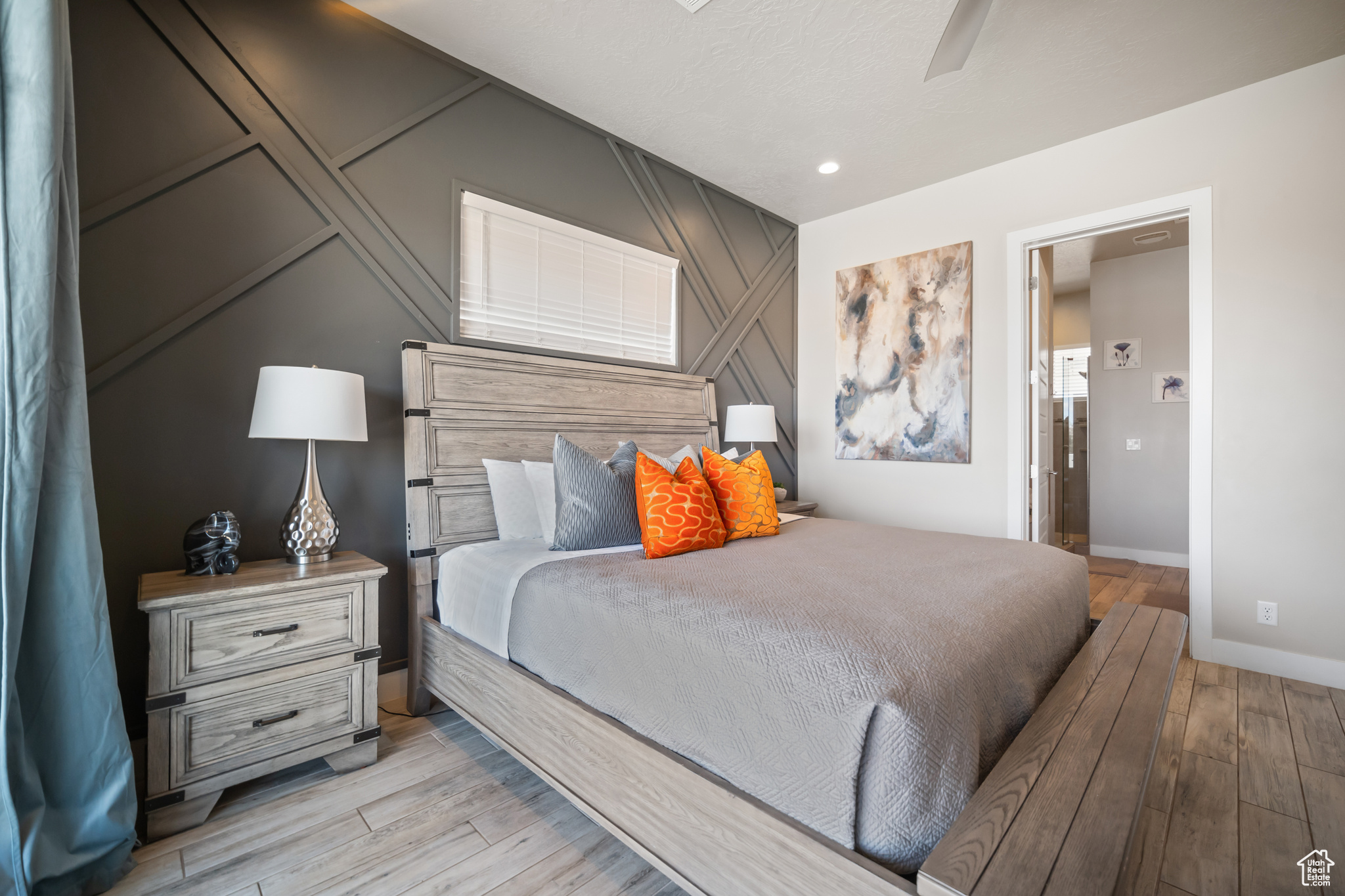 Bedroom featuring light hardwood / wood-style flooring and ceiling fan