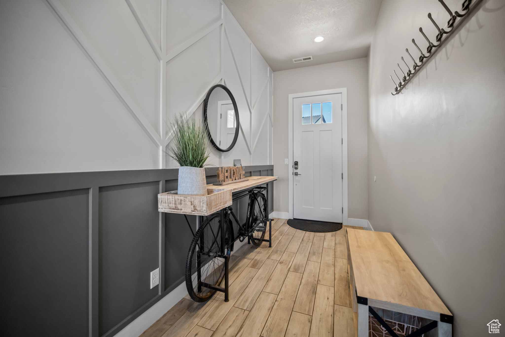 Foyer featuring light hardwood / wood-style flooring