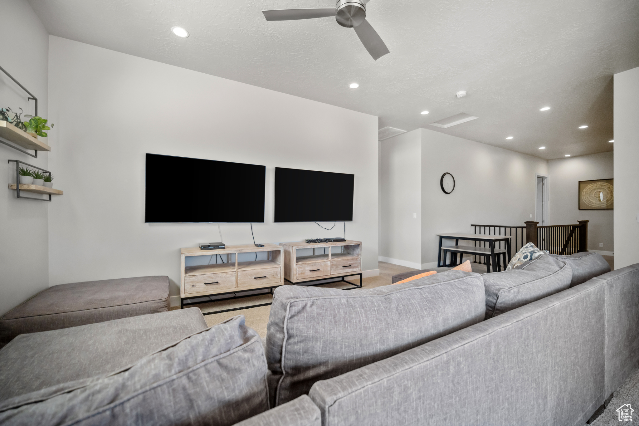 Living room featuring ceiling fan