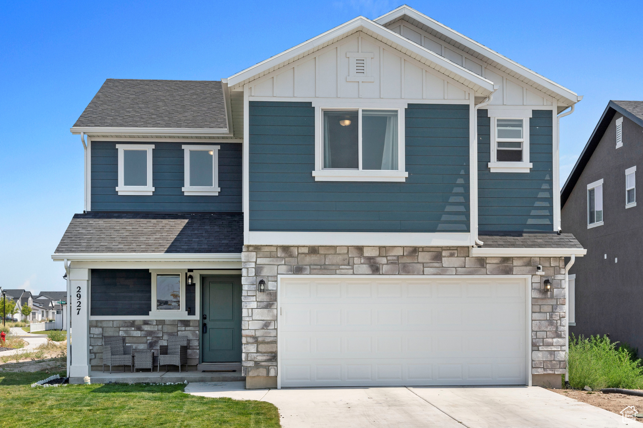 Craftsman inspired home featuring a garage