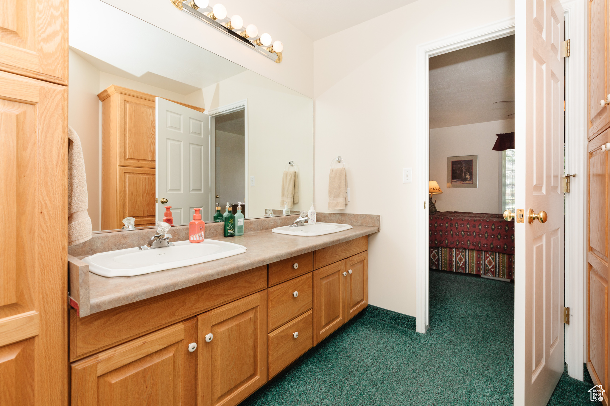 Bathroom with dual bowl vanity